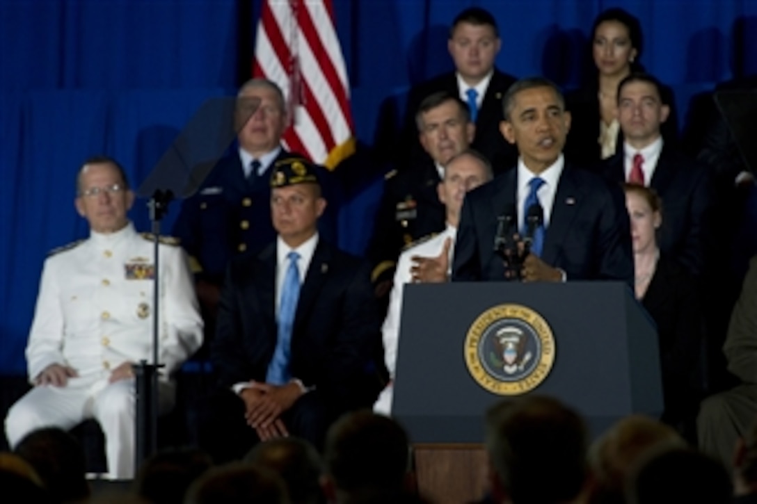 President Barack Obama addresses audience members at the Washington Navy Yard on August 5, 2011.  Obama delivered remarks on the Administration's initiative to help America's veterans find employment.  