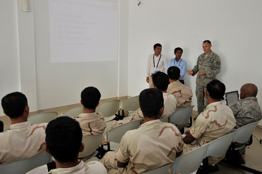 SIHANOUKVILLE, Cambodia – Tech. Sgt. Brady Redhage briefs Royal Cambodian Armed Forces about aerial port equipment during a subject-matter expert exchange here Aug. 9, 2011. The exchange was part of PACIFIC ANGEL 11-1, an operation which supports U.S. Pacific Command’s capacity-building efforts by partnering with other governments in the region to provide medical, dental, optometry and engineer assistance to their citizens. Sergeant Redhage is an aerial porter assigned to the 36th Mobility Response Squadron, Andersen Air Force Base, Guam. (U.S. Air Force photo/Staff Sgt. Christopher Boitz)