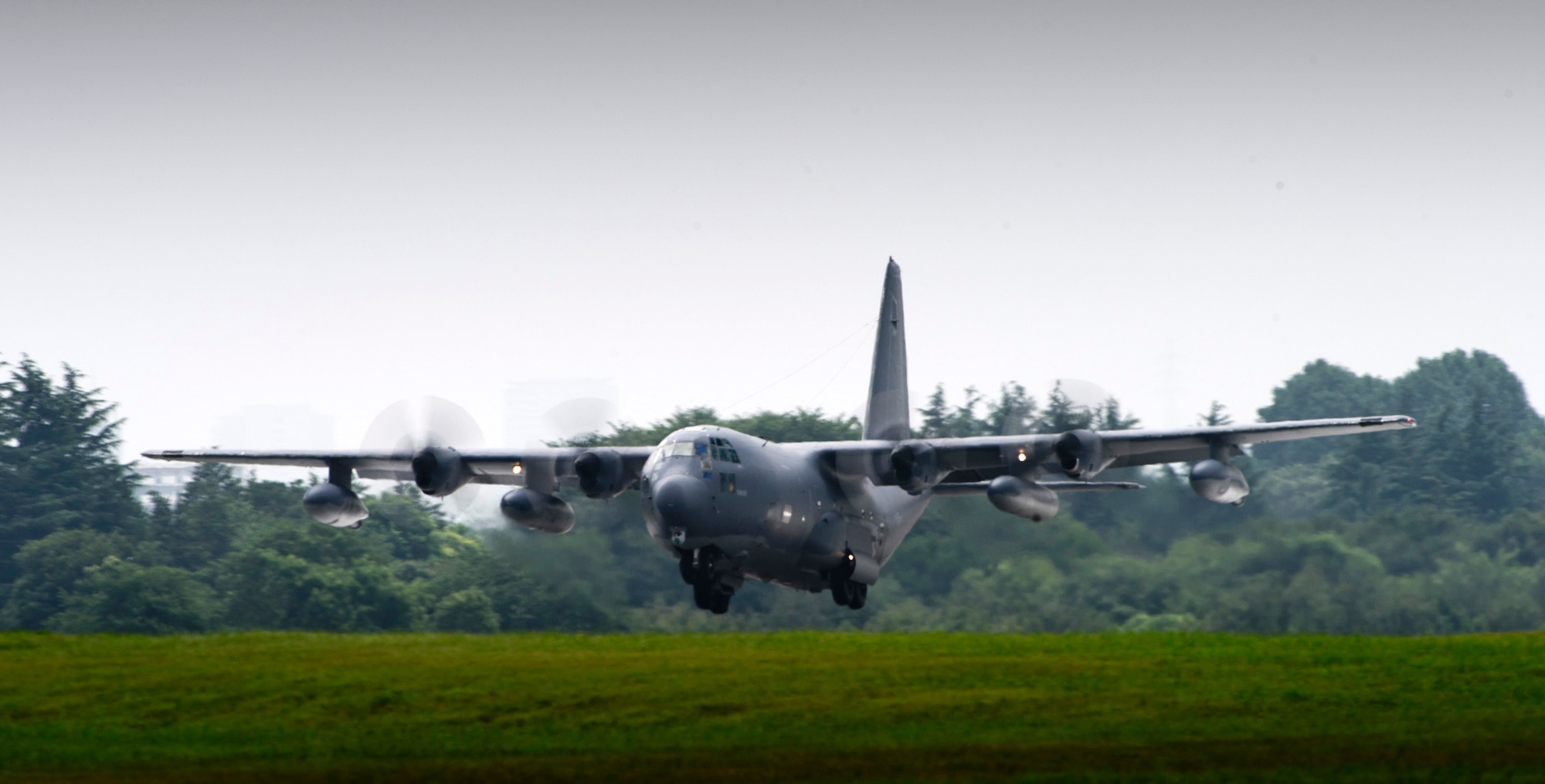 YOKOTA AIR BASE, Japan -- An MC-130P Combat Shadow lands at Yokota Air Base, Japan, Aug. 2, 2011. Several aircraft, including this MC-130P, traveled from Kadena Air Base to take shelter from a typhoon headed toward Okinawa. (U.S. Air Force photo/Staff Sgt. Samuel Morse)