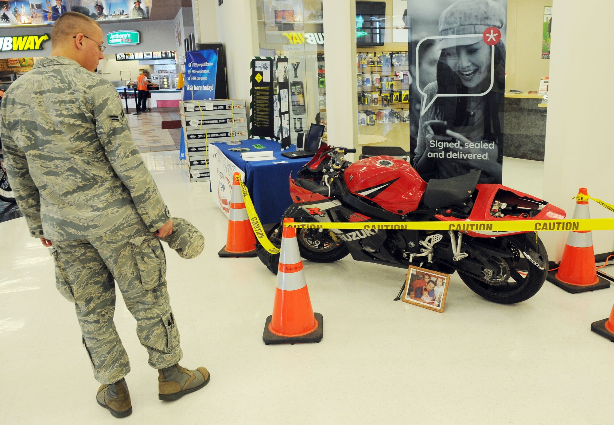 Airman 1st Class Jason Simpson views a safety display at the Base Exchange August 8, 2011, Eielson Air Force Base, Alaska. The safety display provides Airmen with information on motorcycle safety as part of Eielson's Voluntary Protection Program. Airman Simpson is assigned to the 354th Communications Squadron. (U.S. Air Force photo/Airman 1st Class Janine Thibault)
