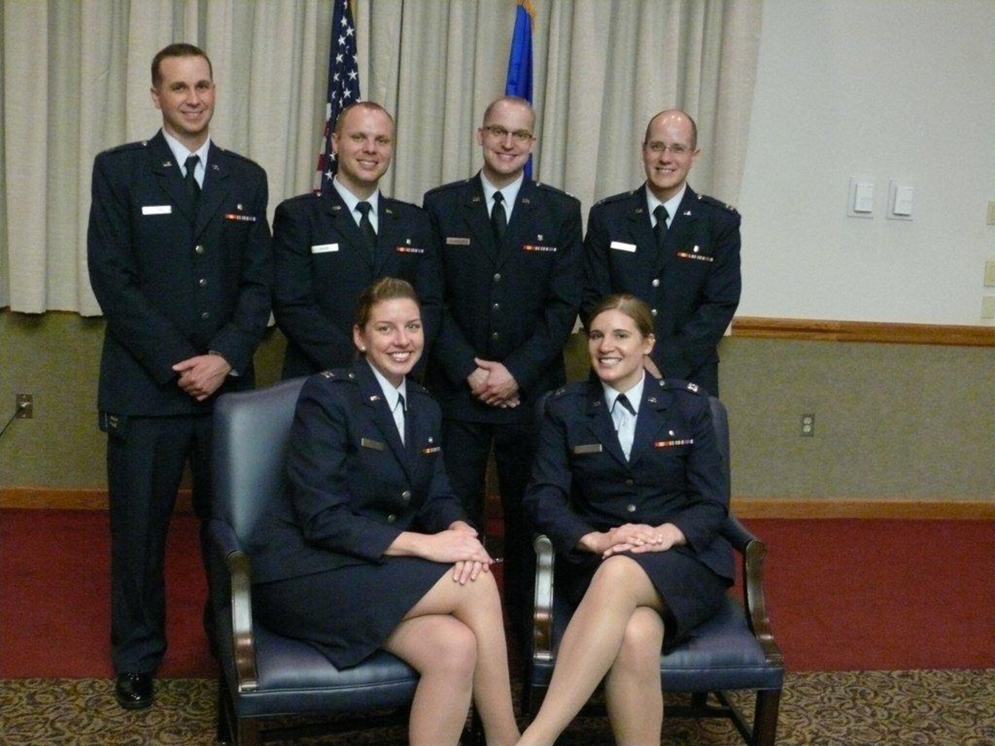 Members of the Nellis Advanced Education in General Dentistry residency class of 2010-2011 gather for a photo before their graduation ceremony Aug. 5, 2011, at the Nellis Club. The graduates include, from top left to bottom right, Captains Trenton Buttars, Joseph Kayne, Kevin Rasmussen, Jonathan Cardon, Danielle Wehri and Colleen Ferriter. (Courtesy photo)