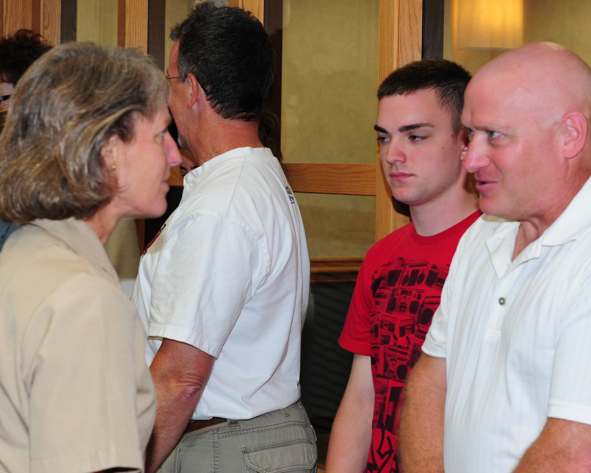 Rear Admiral Robin L. Graf, Commander of U.S. Navy Recruiting Command thanks the parents of new recruits for their sacrifices after a swearing in ceremony at the Buffalo Military Entrance Processing Station.  The Admiral visited the Niagara Falls Air Reserve Station August 8-9, 2011. (U.S. Air Force photo by Peter Borys)