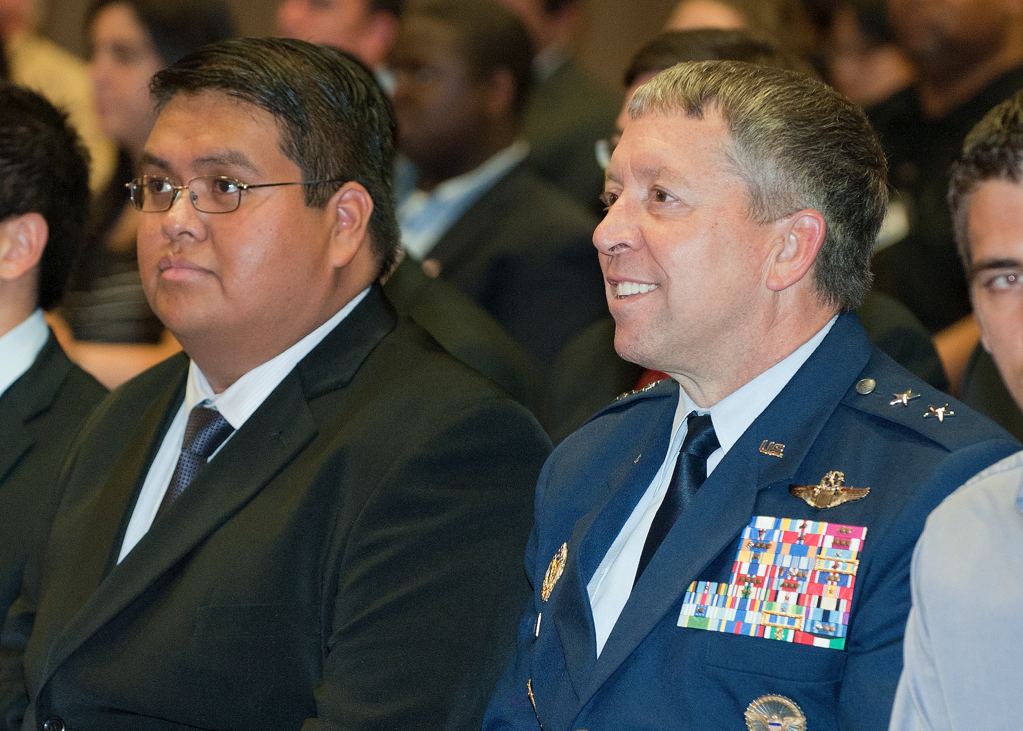 Michael Nakai sits with Maj. Gen. Gregory Feest, the Air Force chief of safety and commander of the Air Force Safety Center at Kirtland Air Force Base, N.M., while awaiting the presentation of the 2011 Judith C. Gilliom Outstanding Workforce Recruitment Program College Student with Disabilities Award at a ceremony Aug. 5, 2011, at the Department of Labor headquarters in Washington, D.C.  Nakai was one of five recipients of the award.  He is an information technology specialist at the safety center. (U.S. Air Force photo/Jim Varhegyi)