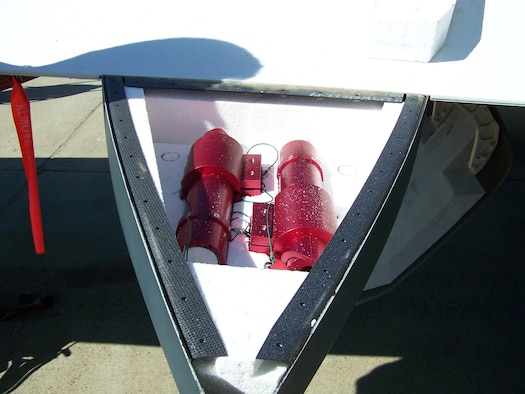 An entire "divert kit" fits snugly in an otherwise empty space in a Global Hawk wing without affecting the aircraft performance. If a Global Hawk is forced to divert to an alternate landing location, ground crews can use the kit to tow the aircraft safely. (U.S. Air Force photo)