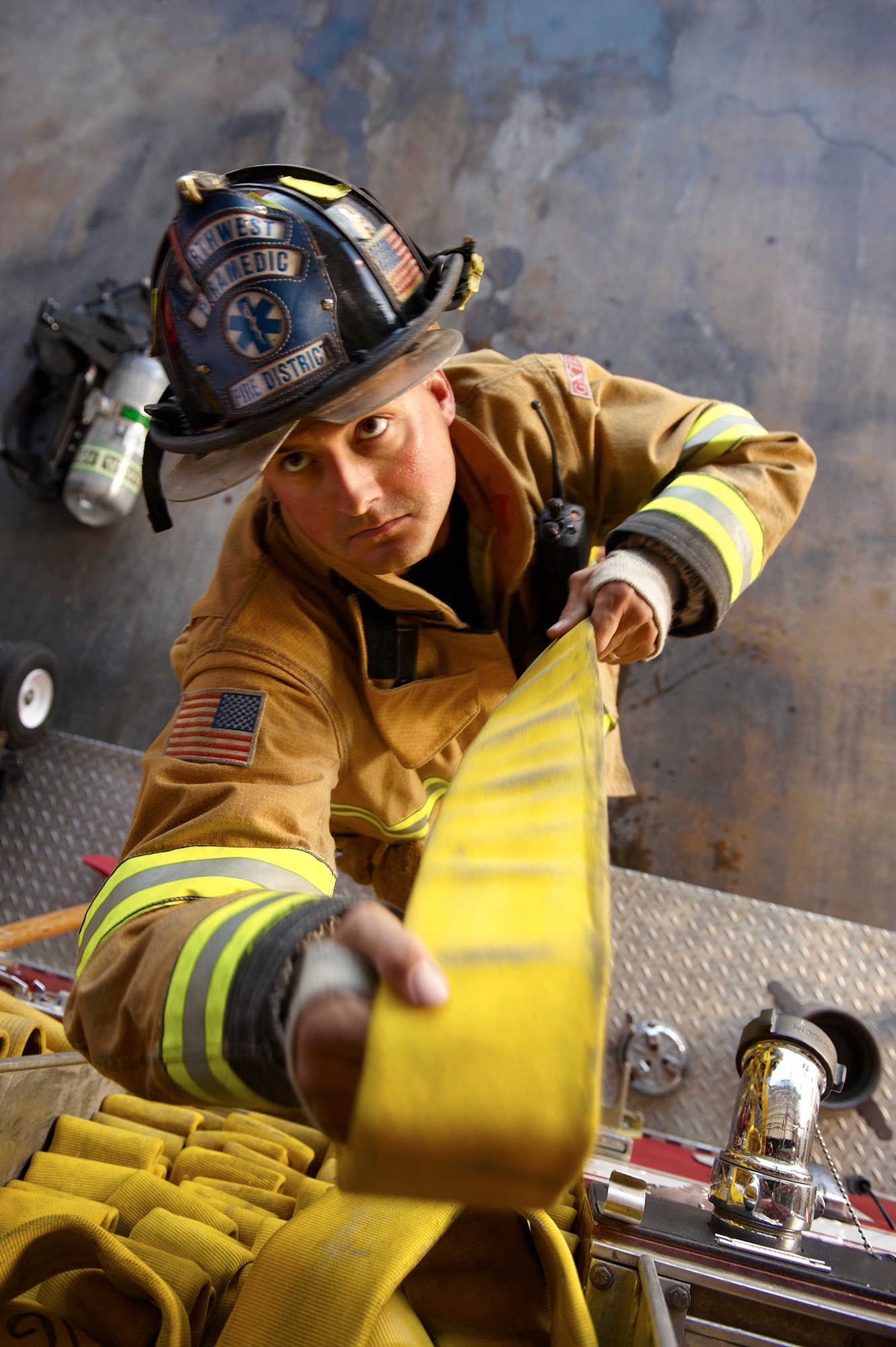 Tech. Sgt. Dave Arneson is photographed by an Air National Guard Creative Team photographer for a “Go ANG” recruiting campaign. This month the Arizona Guardsman will receive “Firefighter of the Year” honors at the annual Air National Guard Fire Chief Association conference in Atlanta. (U.S. Air Force photo/Senior Master Sgt. Rob Trubia)