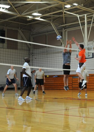 Joint Base Charleston first sergeants take it to the Airmen Leadership School students during a volleyball game at the JB CHS - Air Base gym, Aug. 8. The first sergeants play the student from every ALS flight to build comaraderie and boost morale. (U.S. Air Force photo/Airman 1st Class Ashlee Galloway)