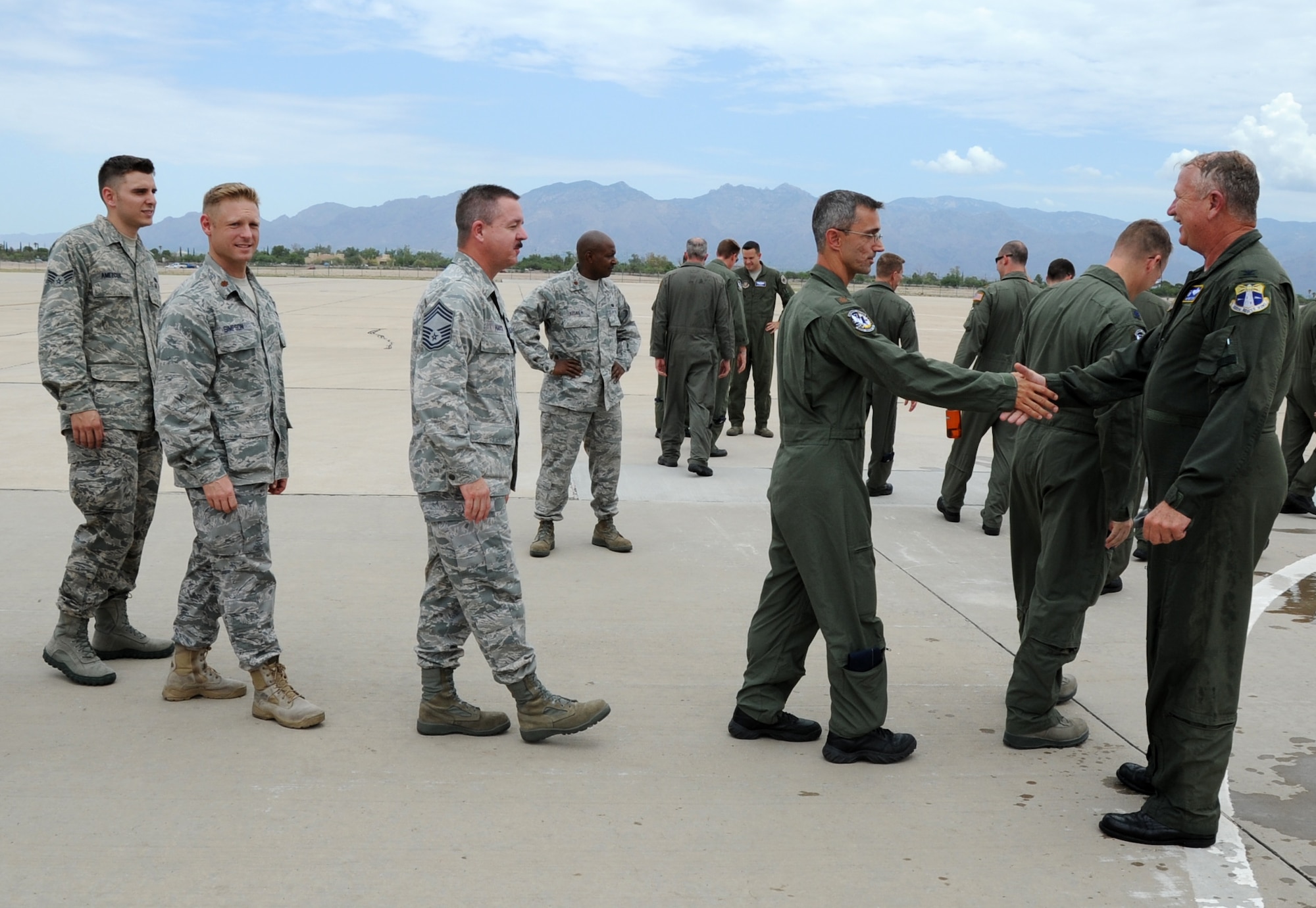Col. Robert Dunn, 920th Rescue Wing commander, greets Airmen from the 943rd Rescue Group after his final fight, Aug. 6. Colonel Dunn visited the 943rd RQG for the final time prior to his retirement in September to address rescue group Airmen for one last time as 920th RQG commander. (U.S. Air Force photo/ Tech. Sgt. Luke Johnson) 