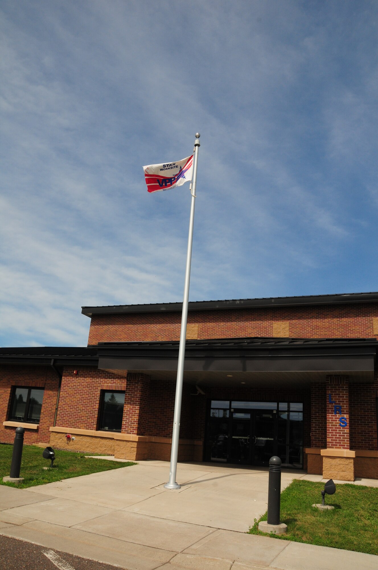 The Voluntary Protection Program flag flies proudly at the 148th Fighter Wing.  The 148th Fighter Wing has just been recertified as part of the VPP as a Star worksite—the Star status is OSHA’s highest rating. 