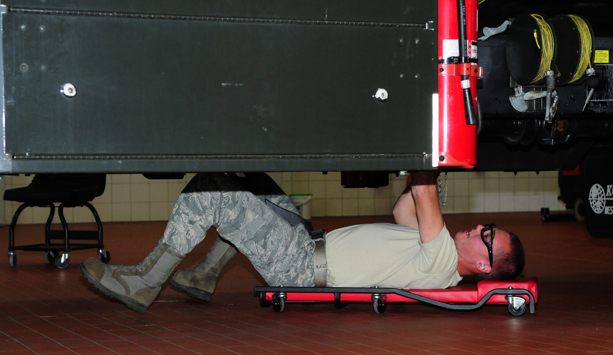 SPANGDAHLEM AIR BASE, Germany – Senior Airman Alex Applegate, 52nd Logistics Readiness Squadron fuels journeyman, performs an inspection on an R-11 6,000 gallon refueler here Aug. 9. The fuel is tested to check for contaminants and monitor the amounts of additives and water in the fuel as part of a monthly inspection. The LRS fuels maintenance flight provides clean, dry fuels and cryogenic products for the 52nd Fighter Wing. (U.S. Air Force photo/Airman 1st Class Matthew B. Fredericks)