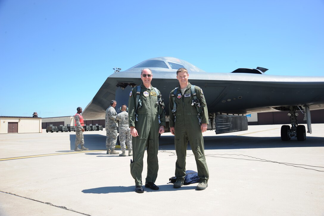 WHITEMAN AIR FORCE BASE, Mo. - Gen. C. Robert Kehler, commander, U.S. Strategic Command, and Capt. Luke Jayne, 325th Weapons School, take a photo after a B-2 Spirit orientation flight August 9.  The B-2 Spirit is a multi-role bomber capable of delivering both conventional and nuclear munitions. A leap forward in technology, the bomber represents a major milestone in the U.S. bomber modernization program.
