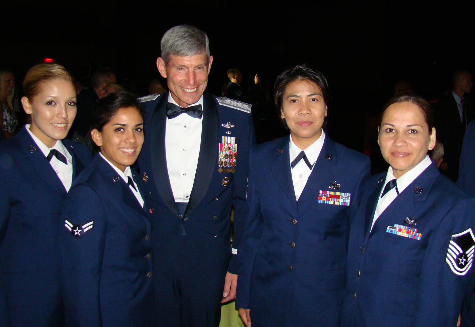 Chief of Staff of the Air Force Gen. Norton A. Schwartz poses with Senior Airman Ritalynn Moss-Celestine, 624th Regional Support Group personnel apprentice; Airman 1st Class Mashwelle Batres, 624th Regional Support Group personnel clerk; Senior Master Sgt. Merian Almosara, 624 Regional Support Group Career Advisor and Master Sgt. Louise Togawa, 44 Aerial Port Squadron Career Advisor at the Air Force Sergeants Association 50th Anniversary Banquet. The banquet was part of the annual Air Force Sergeants Association Conference, held in conjunction with the Air Force Reserve Command Career Advisors Conference. (Courtesy Photo)