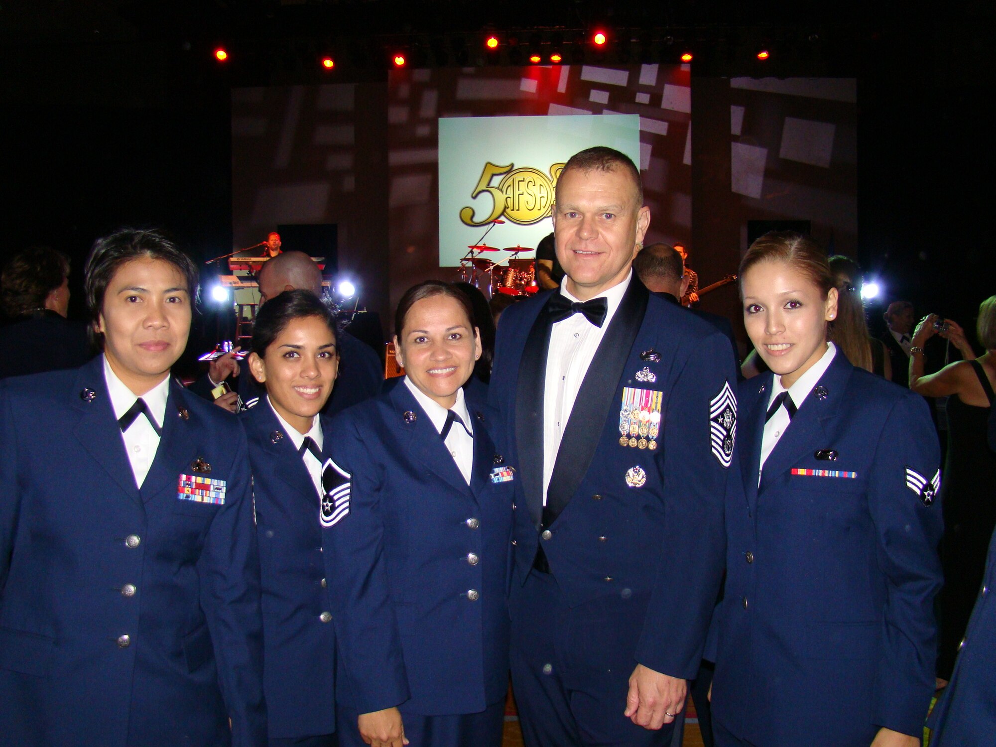 Chief Master Sgt. of the Air Force James A. Roy poses with Senior Master Sgt. Merian Almosara, 624 Regional Support Group Career Advisor, Airman 1st Class Mashwelle Batres, 624th Regional Support Group, Master Sgt. Louise Togawa, 44 Aerial Port Squadron Career Advisor and Senior Airman Ritalynn Moss-Celestine,624th Regional Support Group at the Air Force Sergeants Association 50th Anniversary Banquet. (Courtesy Photo)