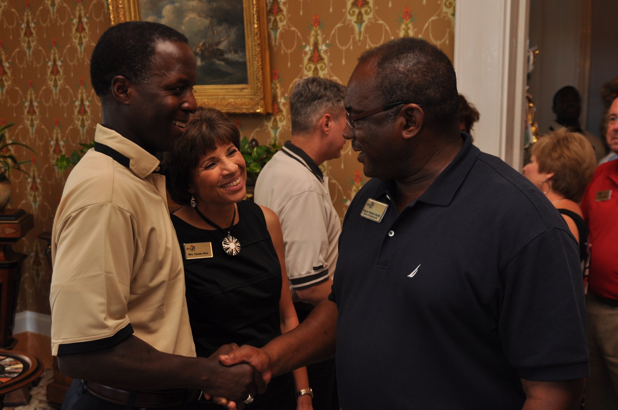 Gen. Edward Rice, Air Education and Training Commander, and his wife Teresa Rice meet Robert Smith, Mayor of Columbus, Miss. at a community reception on Aug. 9. Over 100 community leaders hosted a reception for the visiting AETC senior leaders at Rosedale, a historic Antebellum home in downtown Columbus, Miss. (U.S. Air Force photo/Airman 1st Class Chase Hedrick)