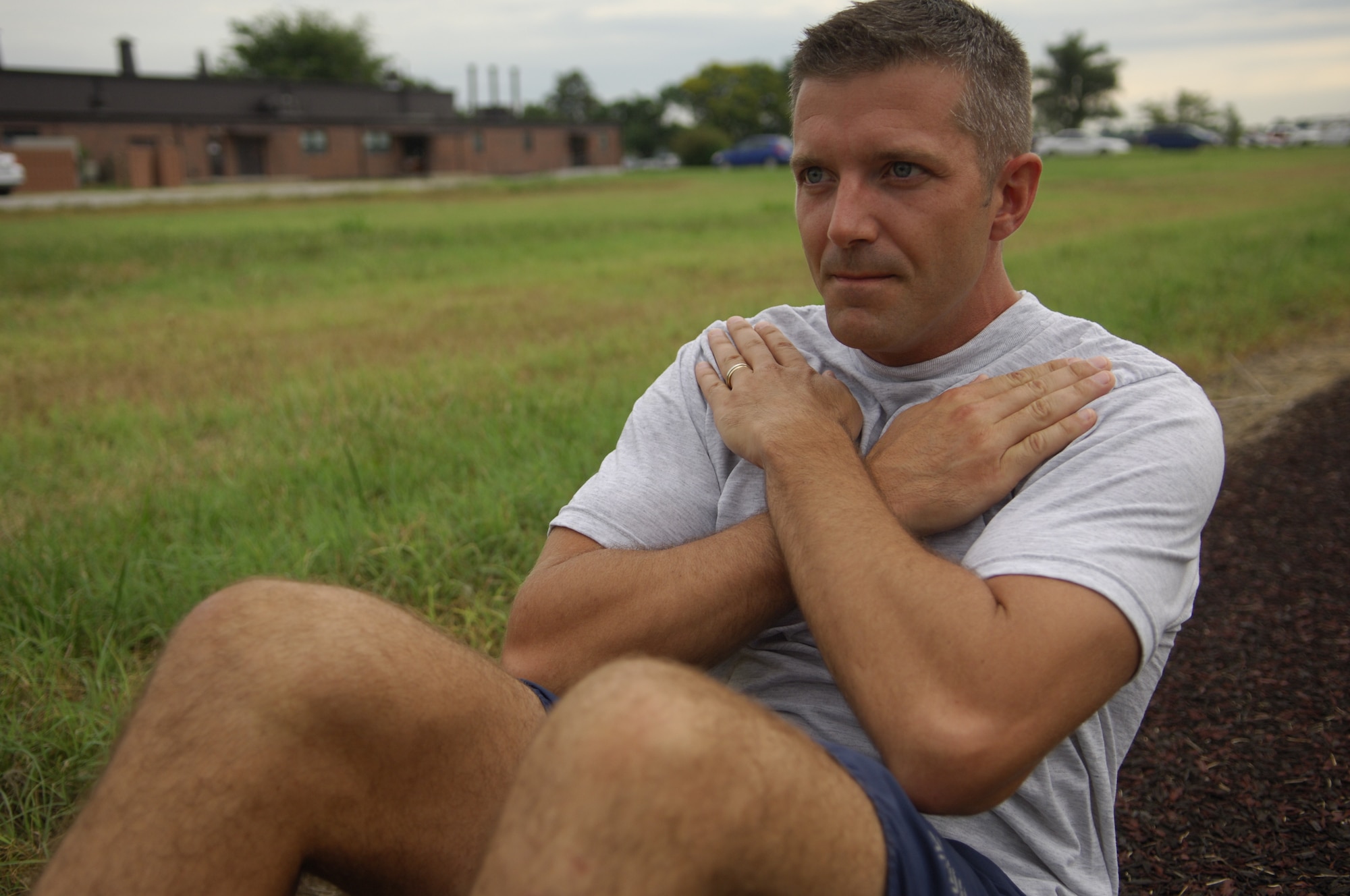 Master Sgt. Kyle Bunn, an airfield systems manager for AFNIC, pumps out some sit-ups at Scott Air Force Base, Aug. 5, 2011. Bunn has scored perfectly on every PT test he has taken since the start of the new program in 2003. (U.S. Air Force photo/ Airman 1st Class Jake Eckhardt)