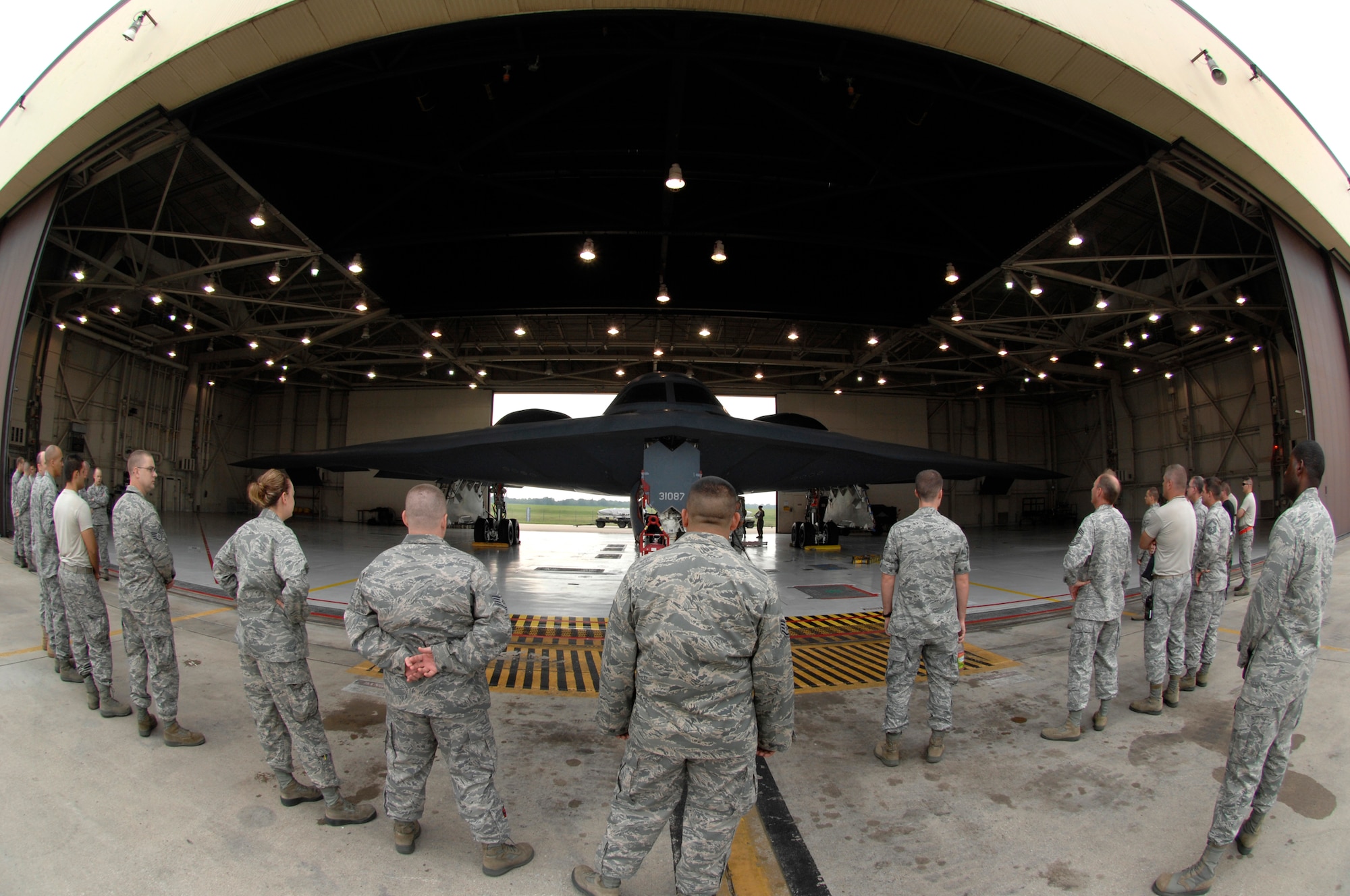 WHITEMAN AIR FORCE BASE, Mo. - Airmen from around Whiteman watch as a team of 131st Aircraft Maintenance Squadron members compete in a load portion of the Air Force Global Strike Command Challenge here, Aug. 5, 2011. The challenge brings operations, maintenance and security forces teams from bomber and missile wings around the Global Strike Command to claim who's the best-of-the-best. (U.S. Air Force photo/Airman 1st Class Cody H. Ramirez)