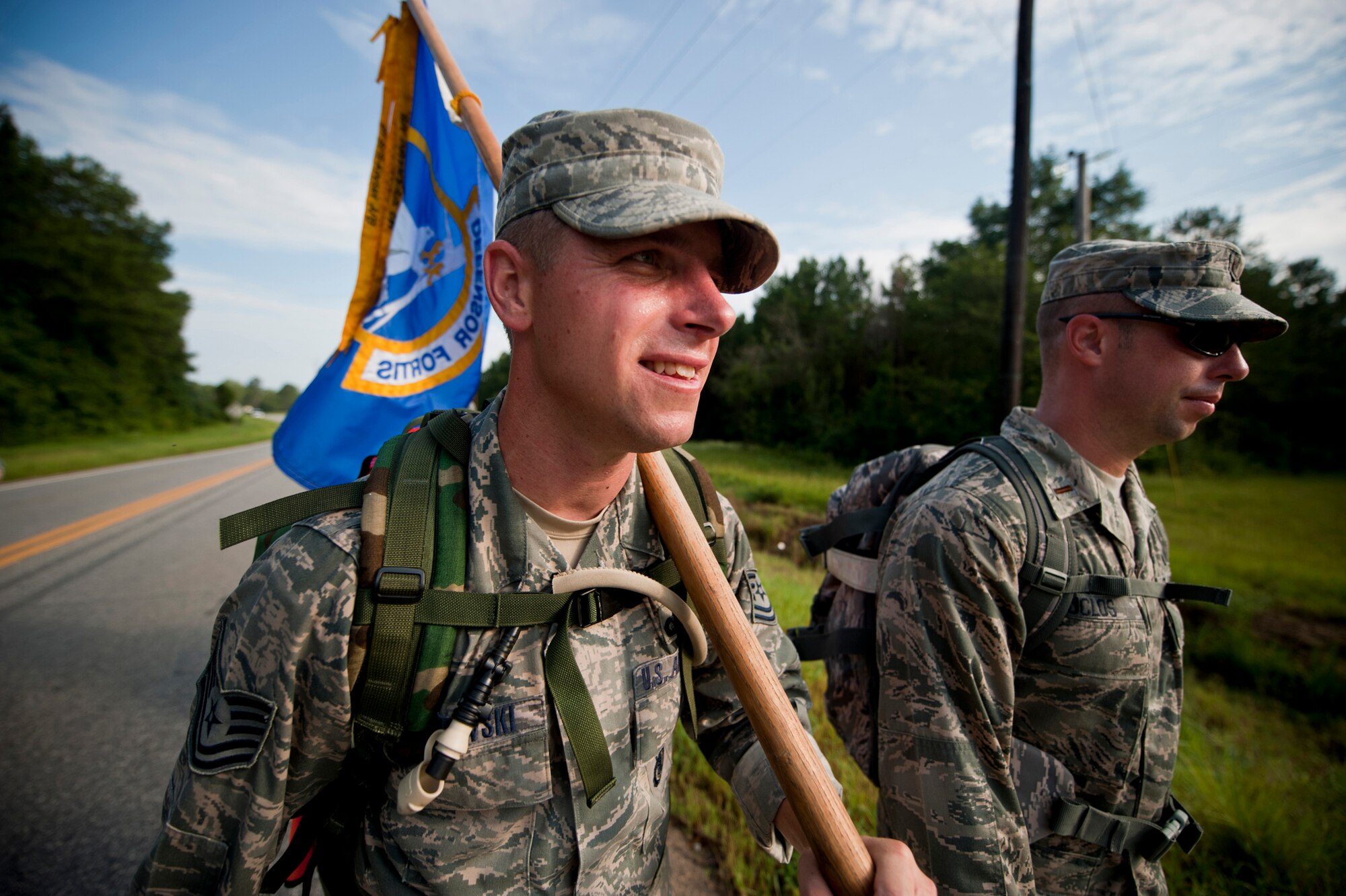 U.S. Air Force Tech. Sgt. Kurt Pinkowski, 23rd Security Forces Squadron investigations NCO in charge, left, and 2nd Lt. Spencer Duclos, 23rd SFS logistics officer, lead a team of Moody Air Force Base members during their portion of the Ruck March to Remember Aug. 9, 2011, near Preston, Ga. Ruck March to Remember is a 2,181-mile march in honor of the defenders who have fallen by enemy hands since the start of Operation Enduring Freedom. (U.S. Air Force photo by Staff Sgt. Jamal D. Sutter/Released)