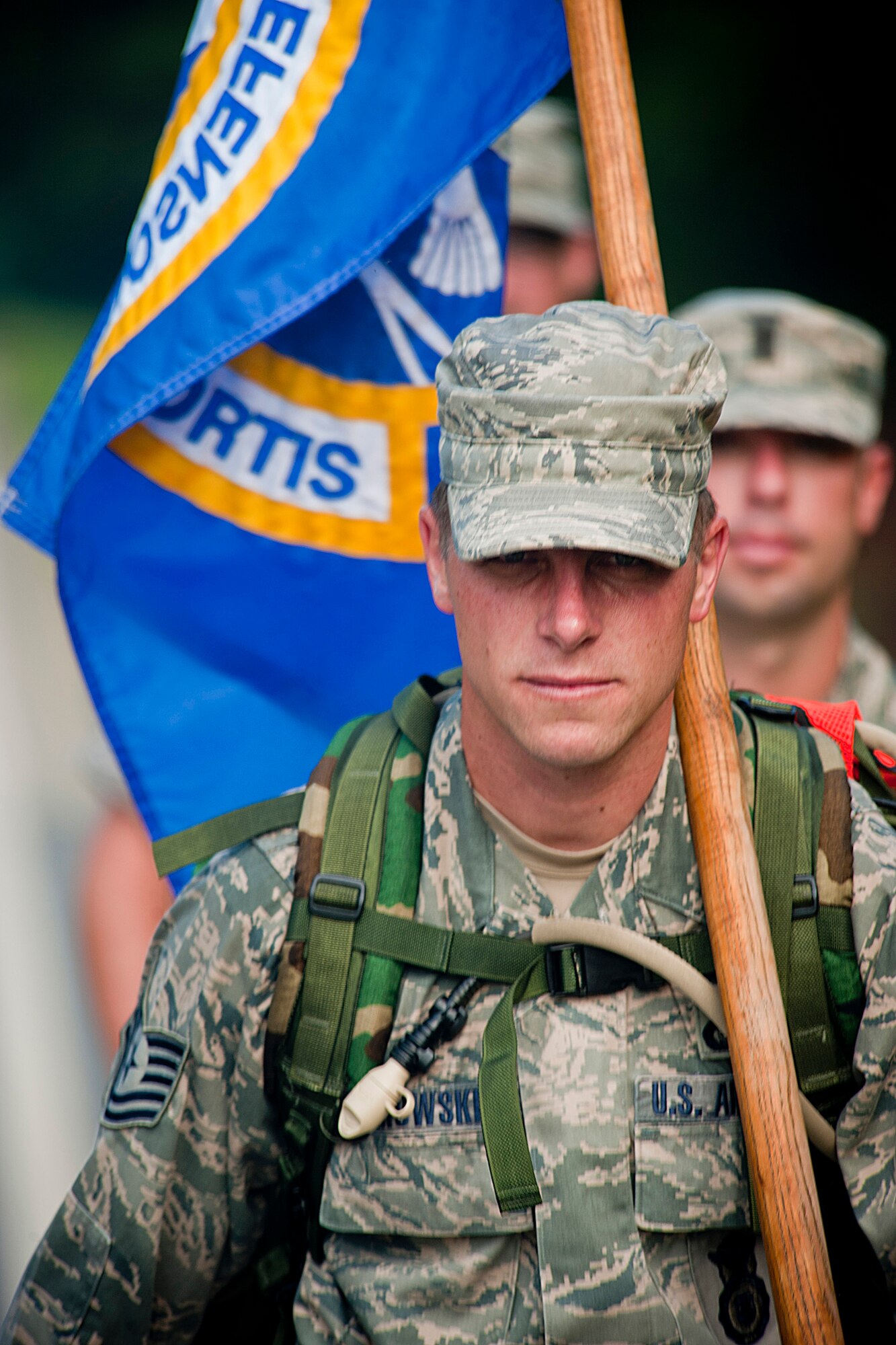 U.S. Air Force Tech. Sgt. Kurt Pinkowski, 23rd Security Forces Squadron investigations NCO in charge, leads a team of Moody Air Force Base members during their portion of the Ruck March to Remember Aug. 9, 2011, near Preston, Ga. With various bases across the nation participating, the daily march is scheduled to end Sept. 11 at ground zero in New York on the 10th anniversary of the 9/11 terrorist attacks. (U.S. Air Force photo by Staff Sgt. Jamal D. Sutter/Released)