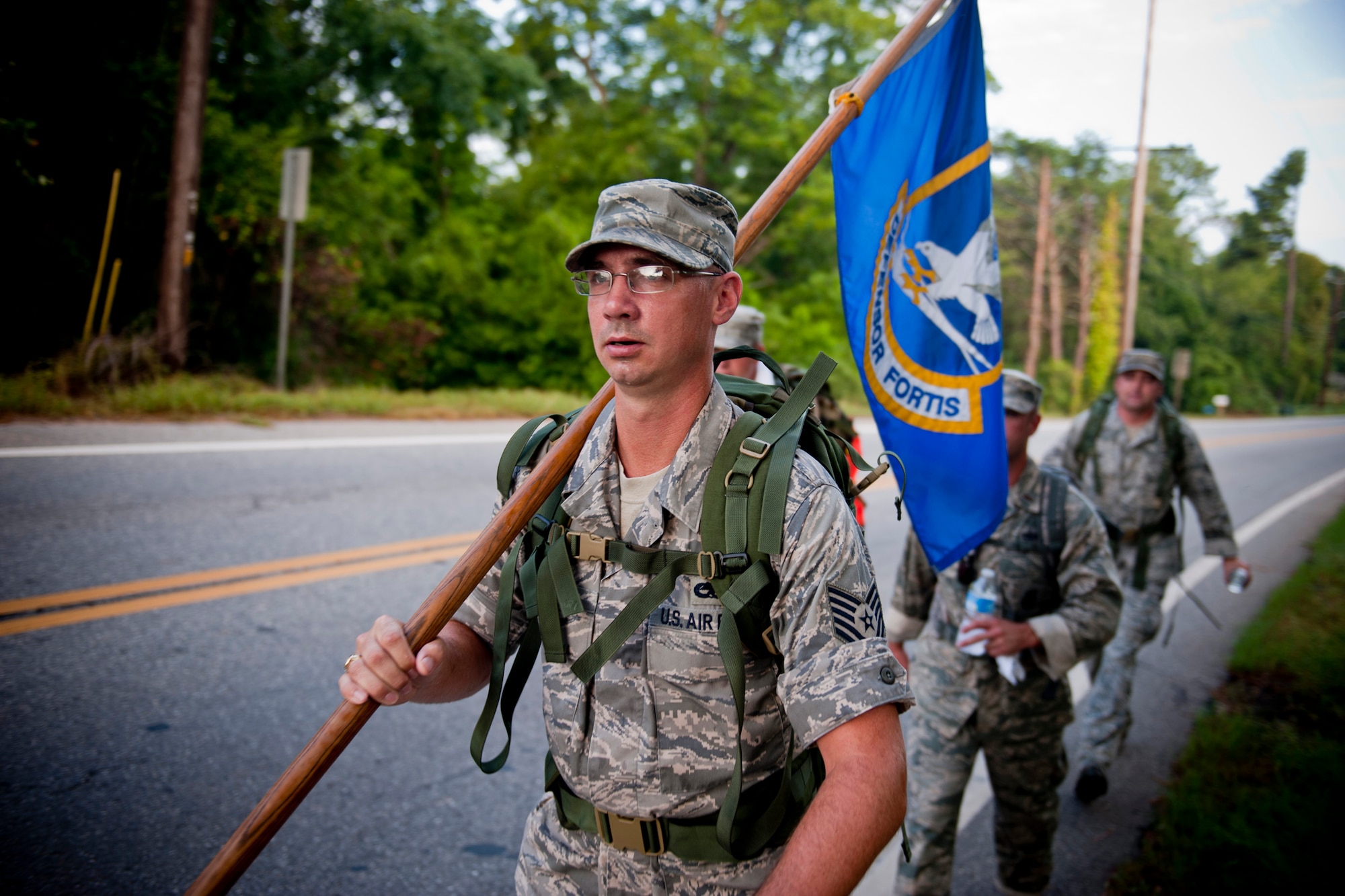 U.S. Air Force Tech. Sgt. Brad Barth, 336th Recruiting Squadron marketing NCO, leads a team of Moody Air Force Base members during their portion of the Ruck March to Remember Aug. 9, 2011, near Richland, Ga. After hearing about the march, the 336th RCS decided to participate with the 23rd Security Forces Squadron and represent the base for a worthy cause. (U.S. Air Force photo by Staff Sgt. Jamal D. Sutter/Released)