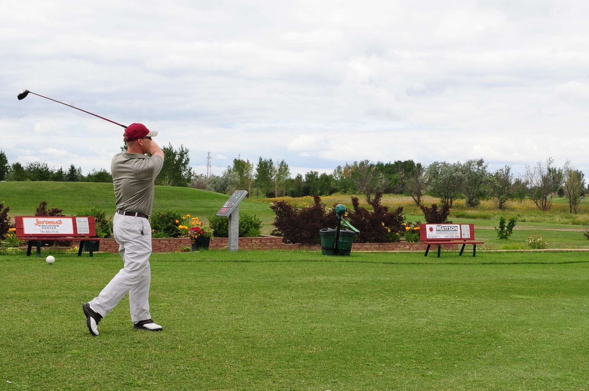 MINOT AIR FORCE BASE, N.D. – Col. S.L. Davis, 91st Missile Wing commander, tees off at the Roughrider gold course for the Minot Area Council’s Golf Scramble here Aug. 8. Events like this promote stronger community relations between base leadership and civic leaders of Team Minot. (U.S. Air Force photo/Senior Airman Michael J. Veloz)