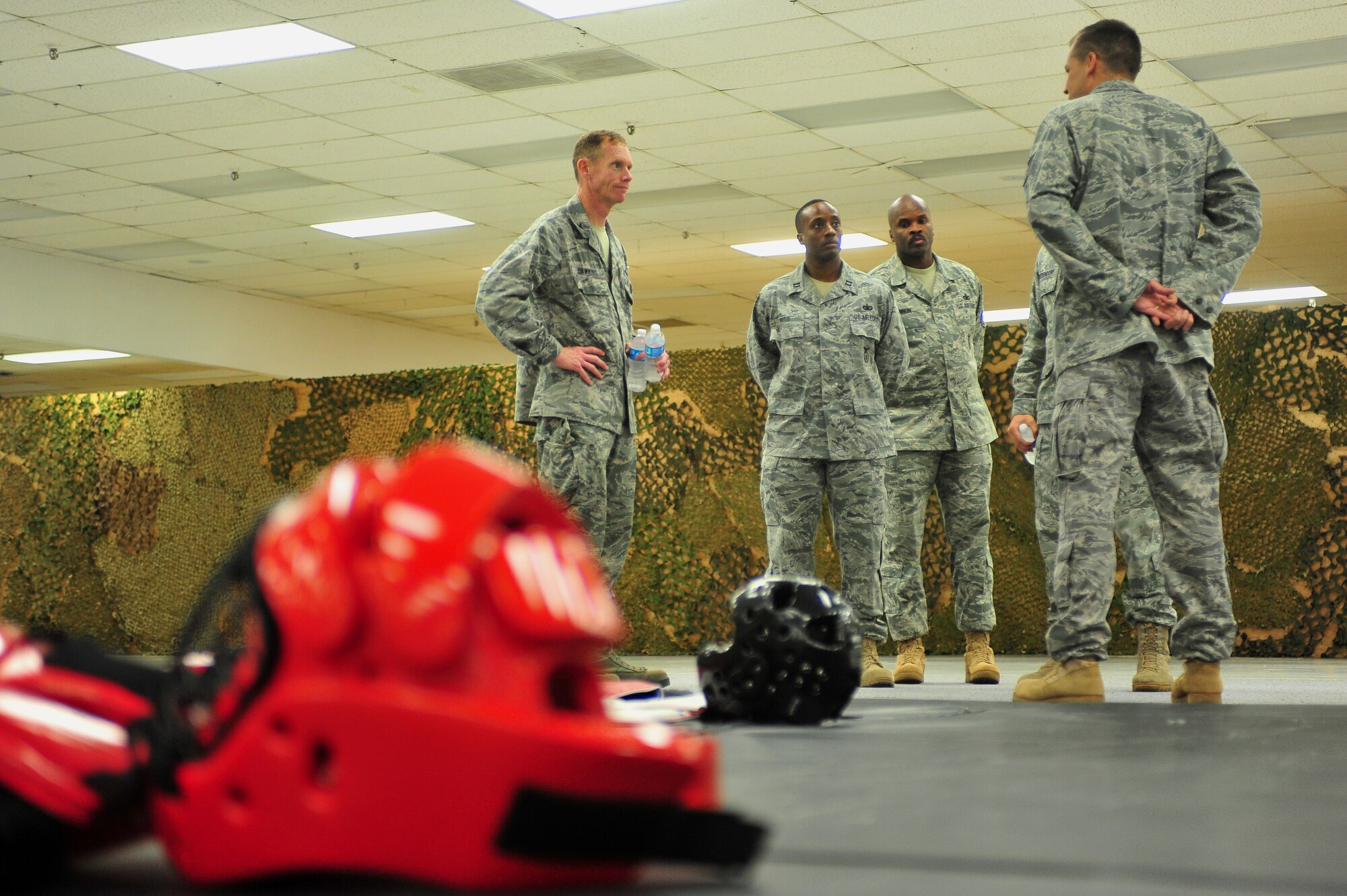 MINOT AIR FORCE BASE, N.D. – Col. James Dawkins, 5th Bomb Wing Commander, tours the security forces squadron’s training facility where self defense classes are held as well as training for tactical response force team members during a tour of the 5th Security Forces Squadron’s base operations here Aug. 9. The 5th SFS demonstrate the daily accomplishment of their primary mission to provide 24-hour law enforcement and security services for the 5th Bomb Wing and all tenant units assigned to Minot AFB. (U.S. Air Force/ Senior Airman Jesse Lopez)