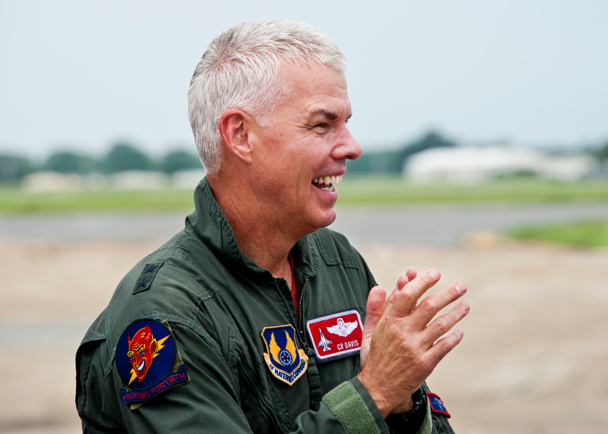 Maj. Gen. C.R. Davis, the Air Armament Center commander, recovers from the hosing he took after his final flight at Eglin Air Force Base, Fla., Aug. 4.  Davis says farewell to AAC and Eglin at a change of command ceremony Aug. 19.  (U.S. Air Force photo/Samuel King Jr.)