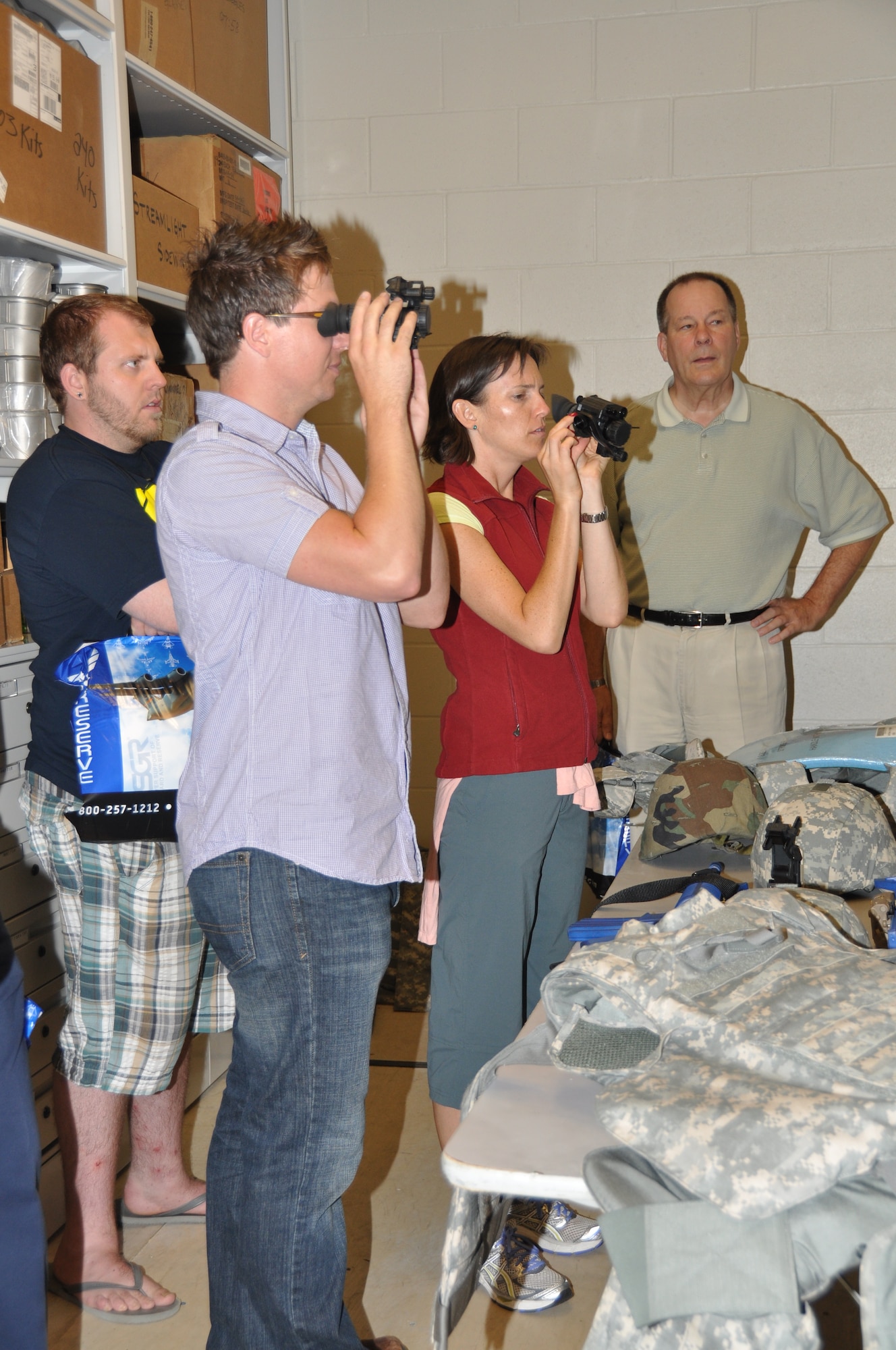 Employers learn about night vision equipment at the 934th Security Forces Squadron during Employers Day Aug. 6. (Air Force photo/Staff Sgt. Kim Hickey).