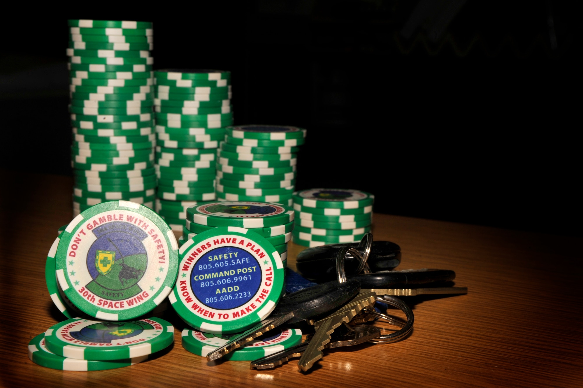 VANDENBERG AIR FORCE BASE, Calif. -- The 30th Space Wing Safety Office reminds Airmen to be safe on and off duty.  A coin, poker chip, was created as a reminder for Airmen in the 30th SW.  (U.S. Air Force photo illustration/Staff Sgt. Andrew Satran) 

 