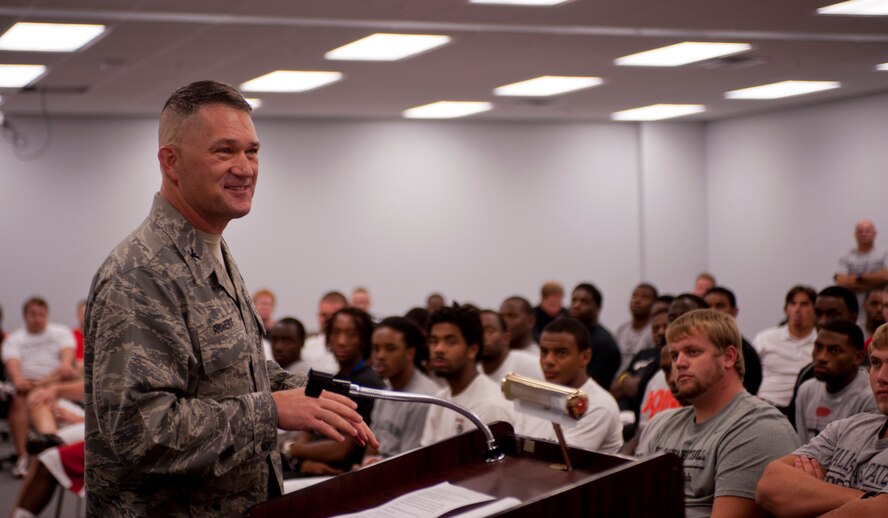 U.S. Air Force Col. Randall Richert, 820th Base Defense Group commander, addresses the Valdosta State University football team during their first team meeting in the VSU Athletic Field House in Valdosta, Ga., Aug. 7, 2011. Richert spoke to more than 100 VSU Blazers about the importance of teamwork and the significance of “completing the mission” as a team. (U.S. Air Force photo by Andrea Thacker/Released)