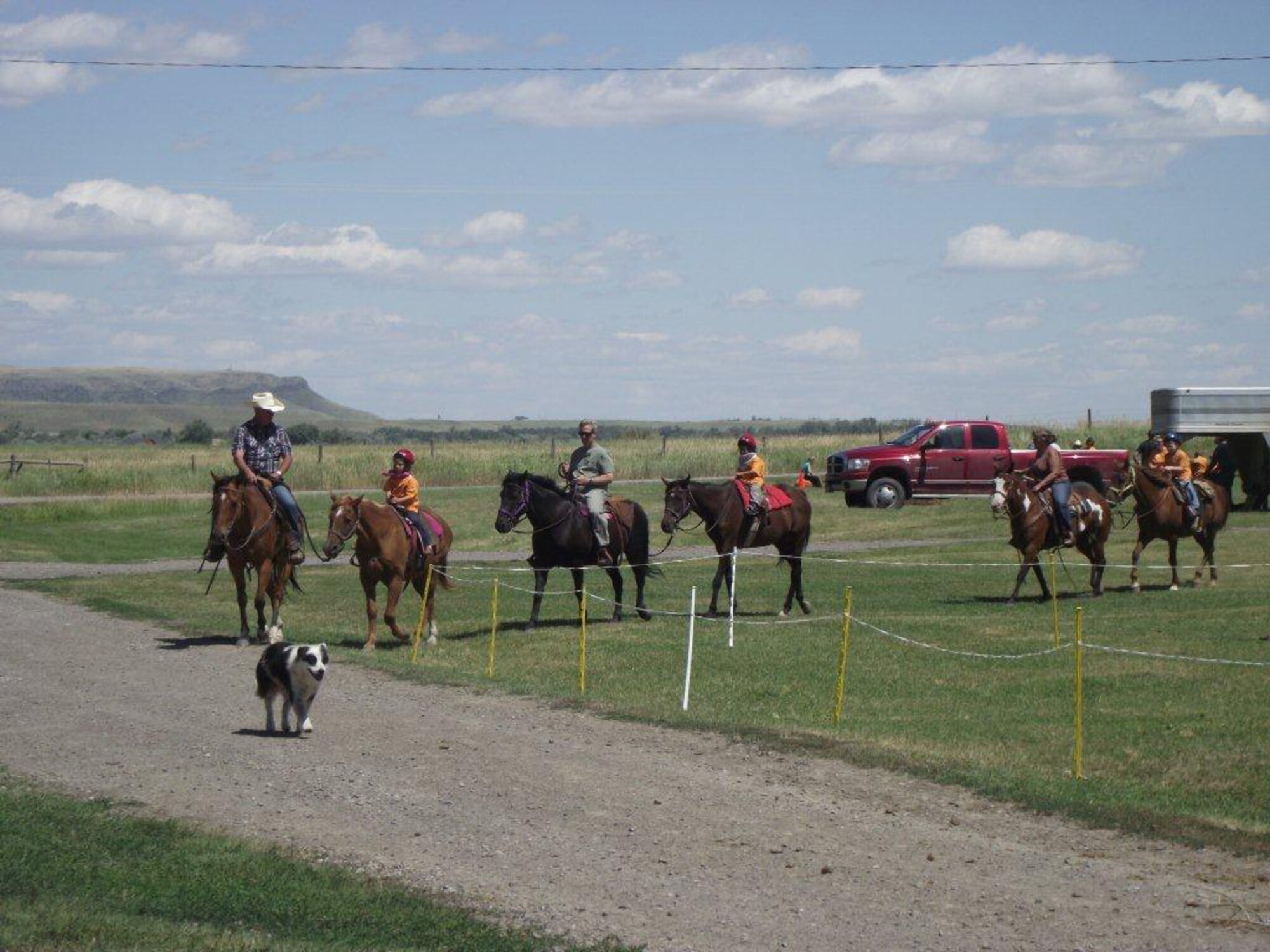 Volunteers at Bull Run Guest Ranch in Cascade, Mont., lead Youth Center campers on a horseback ride July 26.  (Courtesy Photo)