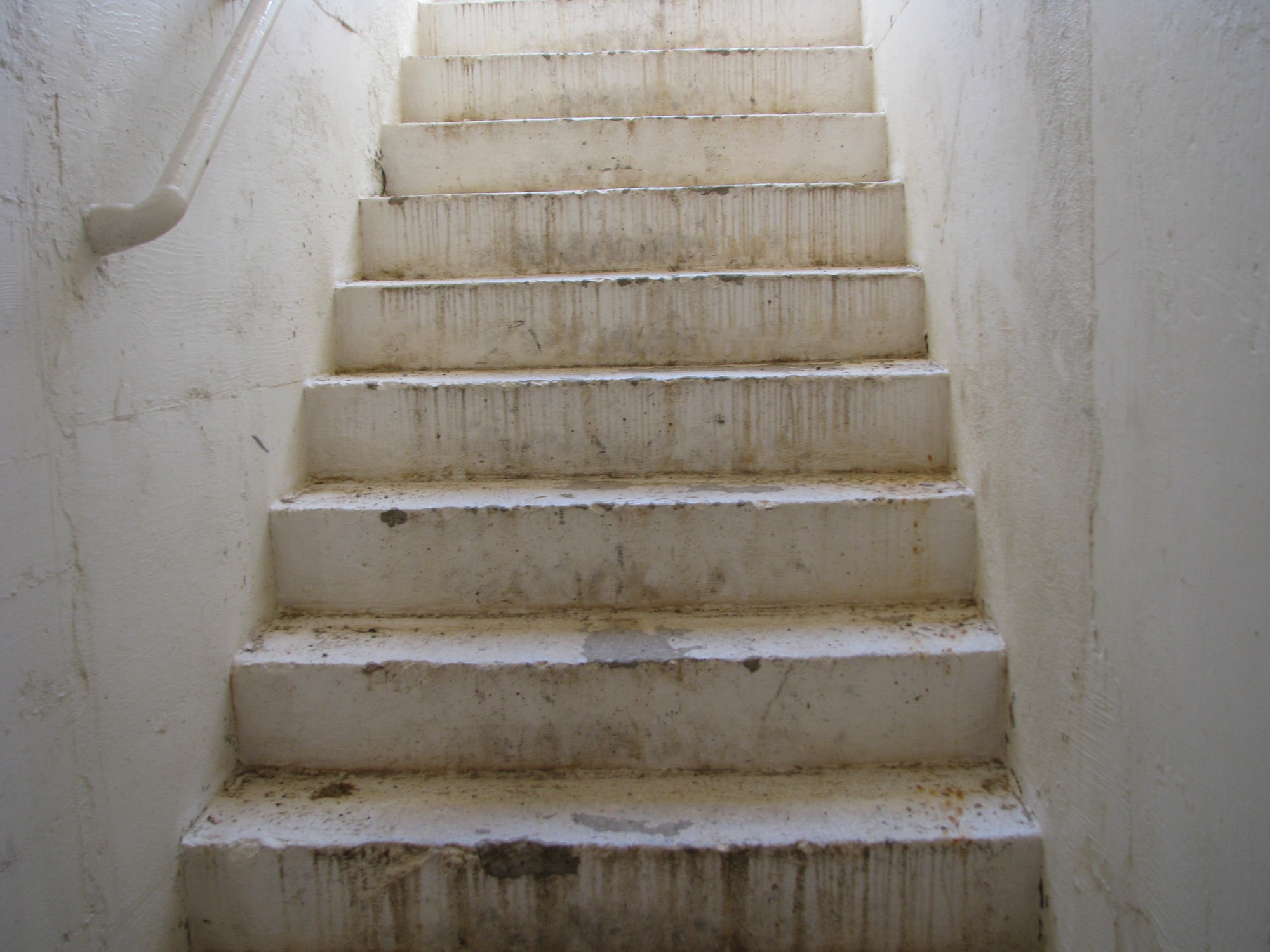 The stairwell leading to the underground thrust test facility at Pad 18 is scheduled to be sandblasted, scraped and repainted as is most of the underground structure. The only area not being renovated at this time is the control room. (Air Force photo by Diane Betzler)