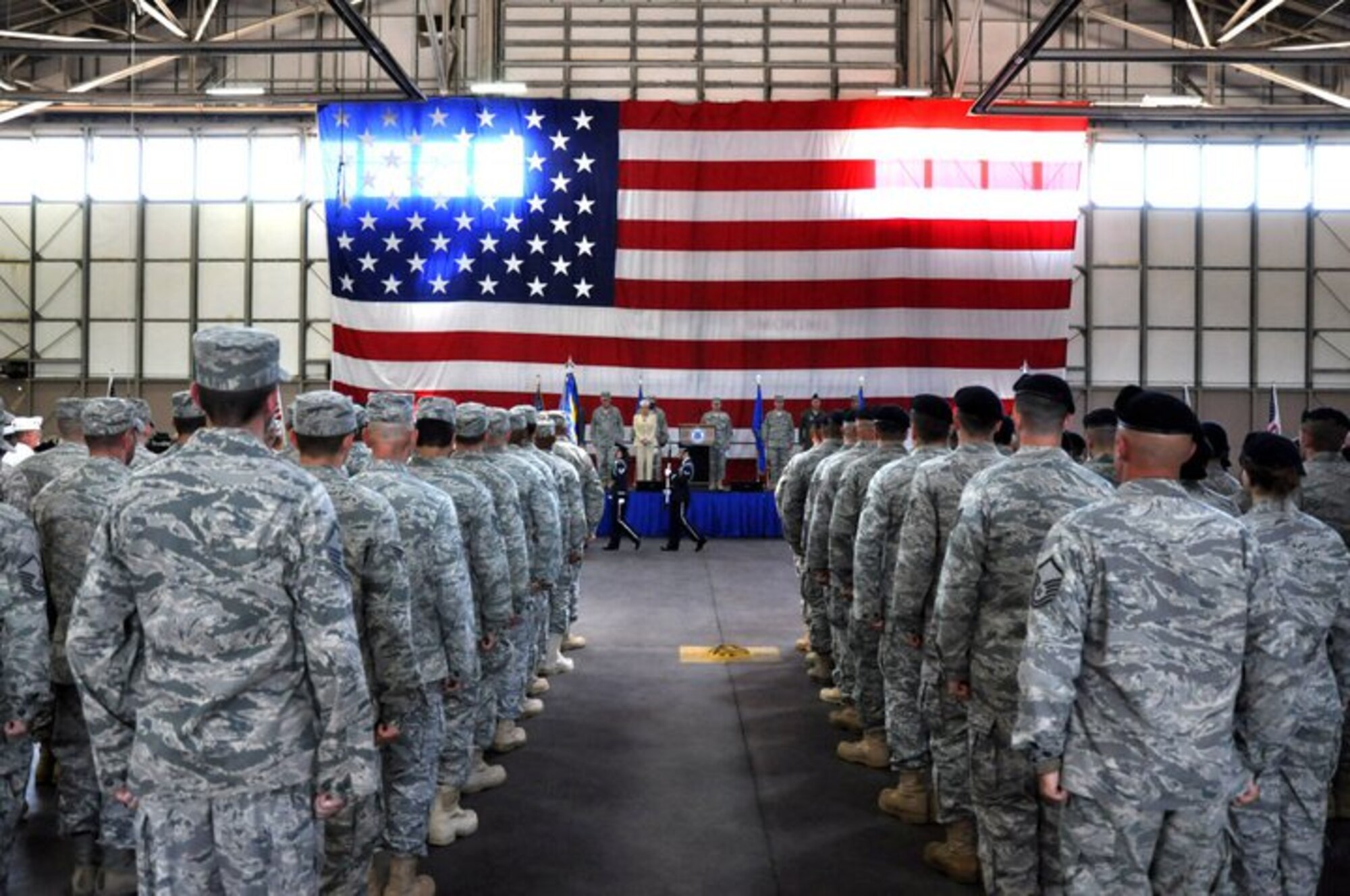 Members of the 103rd Security Forces and Civil Engineer Squadrons, 103rd Airlift Wing, are assembled in formation during a formal Send Off Ceremony July 6, 2011, at Bradley Air National Guard Base, East Granby, Conn. Approximately 80 Connecticut Air National Guardsmen with the 103rd Airlift Wing have since deployed to Afghanistan in support of Operation Enduring Freedom.  (U.S. Air Force photo by Army 2nd Lt. Emily Hein) 