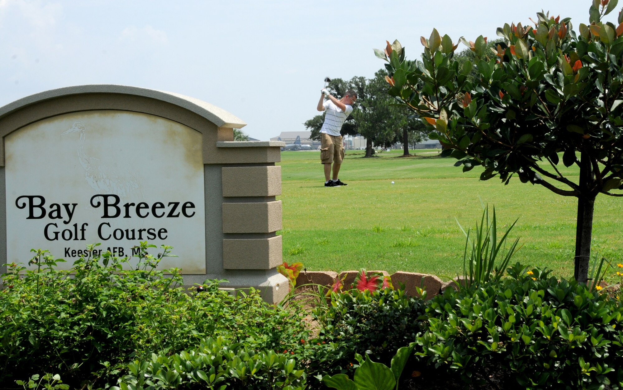 Roger Keith, on temporary duty in the 335th Training Squadron, takes a swing on
Hole 1 August 5. He’s stationed with the 21st Operational Weather Squadron, Sembach Air Base, Germany.  (U.S. Air Force photo by Kemberly Groue)