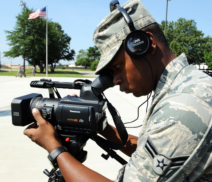 U.S. Air Force Airman 1st Class Blake Hubbard, 20th Fighter Wing Public Affairs broadcaster, films Airmen during Airmen Leadership School, while they practice open ranks at the Education Center, Shaw Air Force Base, S.C. August  9, 2011. Public Affairs Airmen get their opportunity to tell the Air Force's story by highlighting Airmen of all ranks and career fields. (U.S. Air Force photo/Airman 1st Class Tabatha L. Duarte)(Released)