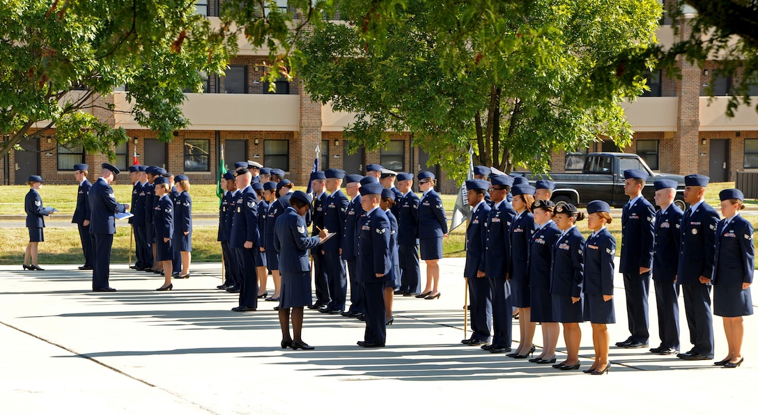 Students attending Airmen Leadership School receive their first official inspection here Aug. 1. The ALS mission is to prepare Senior Airmen to be professional, warfighting Airmen who can supervise and lead Air Force work teams to support the employment of air, space, and cyberspace power. (U.S. Air Force photo/Senior Airman Laura Turner)