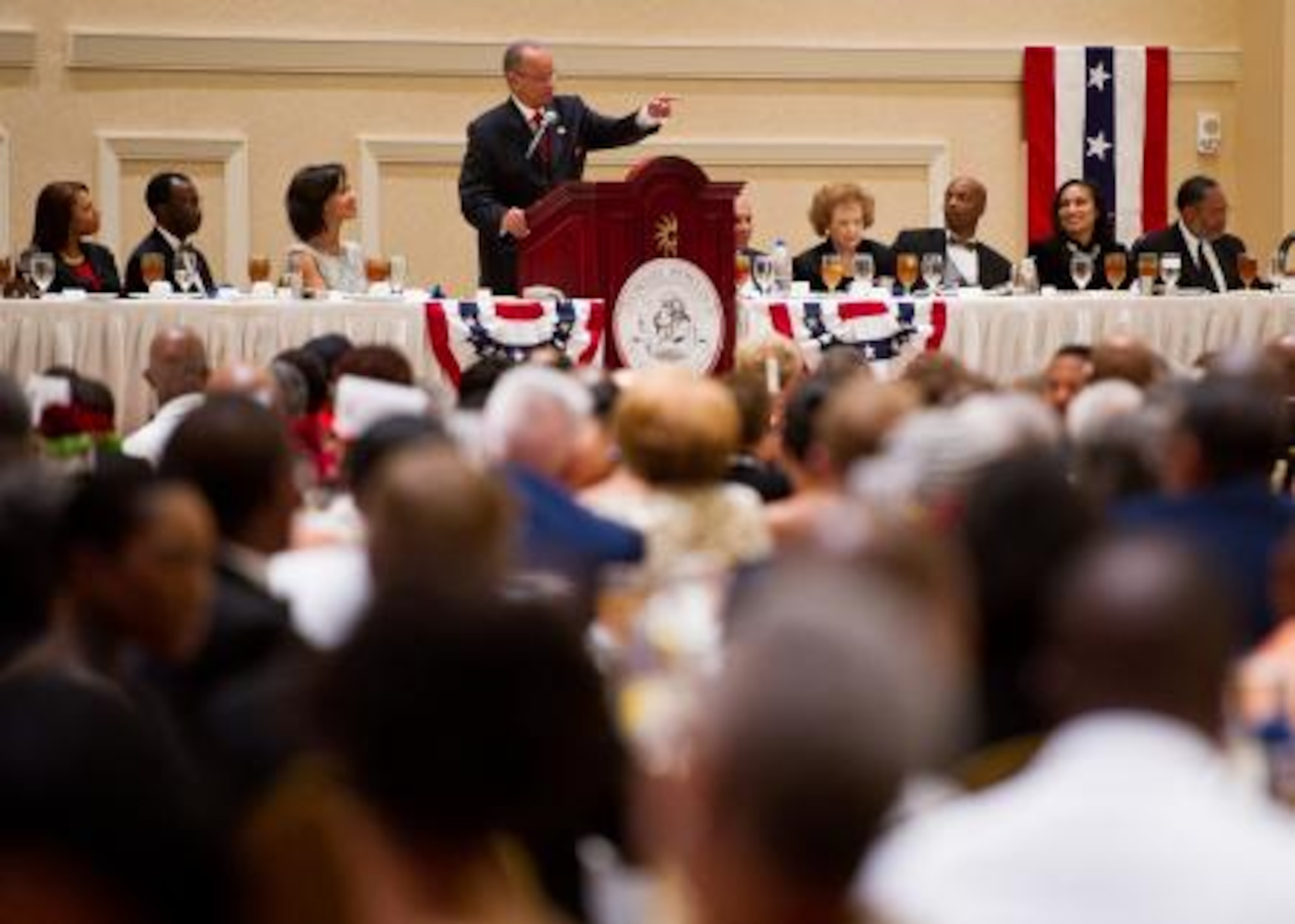 Kent Amos, a deacon, speaks to more than 600 attendees at the gala dinner for the Tuskegee Airmen 40th National Convention, Aug. 6, at the Gaylord National Hotel, Md. He served in the U.S. Army during Vietnam, graduated from Delaware State University. In, 2002, he was ordained as a deacon. (U.S. Air Force photo/  Senior Airman Erik Cardenas)
