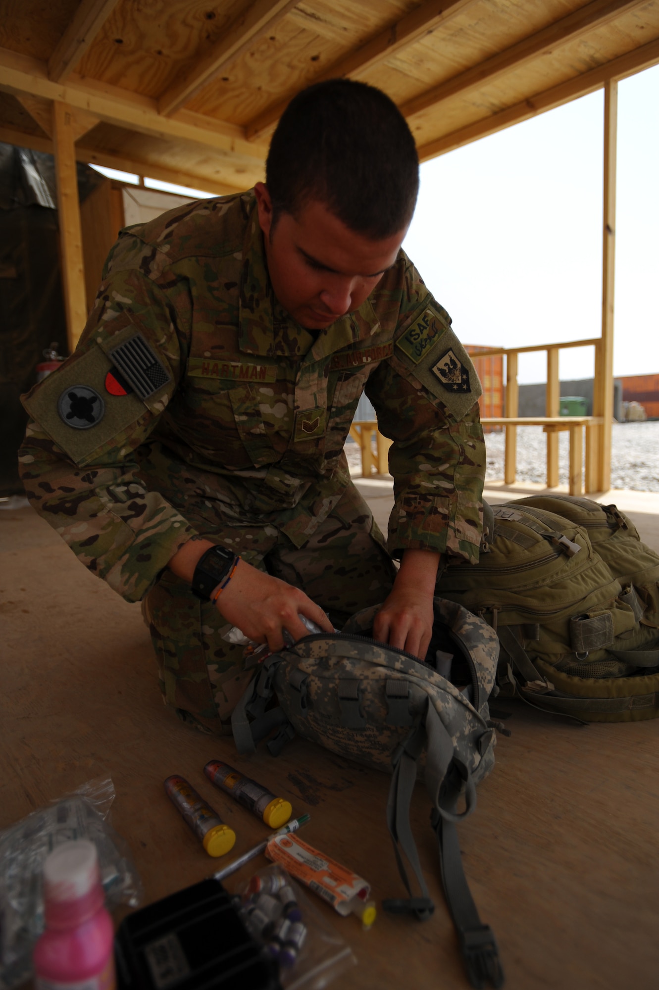 Air Force Staff Sgt. Ryan Hartman, 298th Combat Sustainment Support Battalion medical services technician, conducts an inventory of his medical packs at Shindand Air Base, Afghanistan, Aug. 6, 2011, to ensure sufficient supplies are always ready when he needs them. Hartman is a joint expeditionary tasking, or JET, Airman deployed to Afghanistan and is attached to the Army's 298th CSSB in support of Operation Enduring Freedom. The JET mission is a high visibility program that makes up just five percent of all Air Force deployments and provides combat mission ready Airmen to Army combatant commanders. (U.S. Air Force photo/ Master Sgt. William Greer)