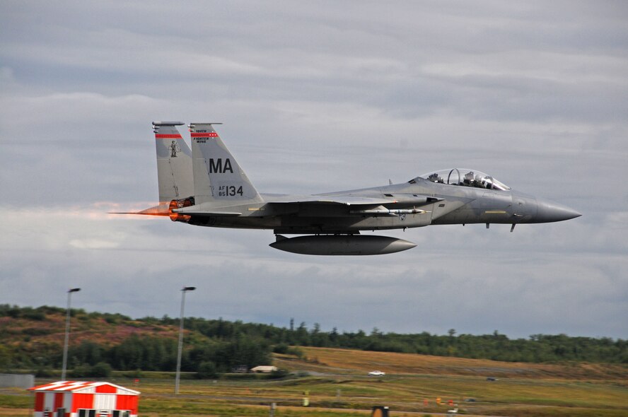 Lt. Col. Daniel Nash and Staff Sgt. Paul Sim from the 104th Fighter Wing, Massachusetts Air National Guard, take off in an F-15D for an incentive flight while deployed to Joint Base Elmendorf-Richardson, Alaska. (U.S. Air Force photo/Tech. Sgt. Anthony Mutti)