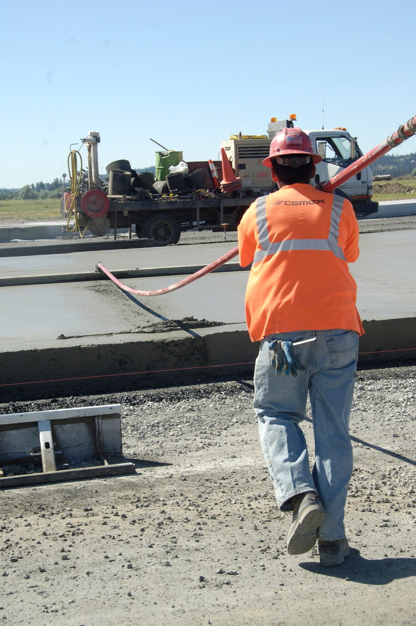 A contractor shaves down Fairchild’s new runway. (U.S. Air Force photo/Airman 1st Class Earlandez Young)