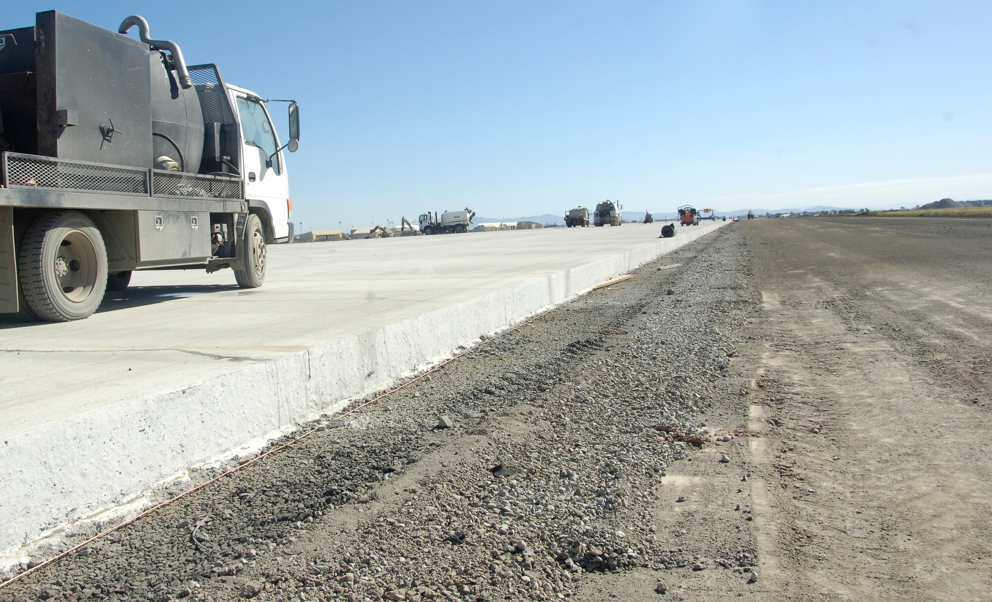 A look at Fairchild’s new and unfinished runway as it is progressing. Contractors will be recycling the concrete from the old runway and putting it on the shoulders of the new runway.  (U.S. Air Force photo/Airman 1st Class Earlandez Young)