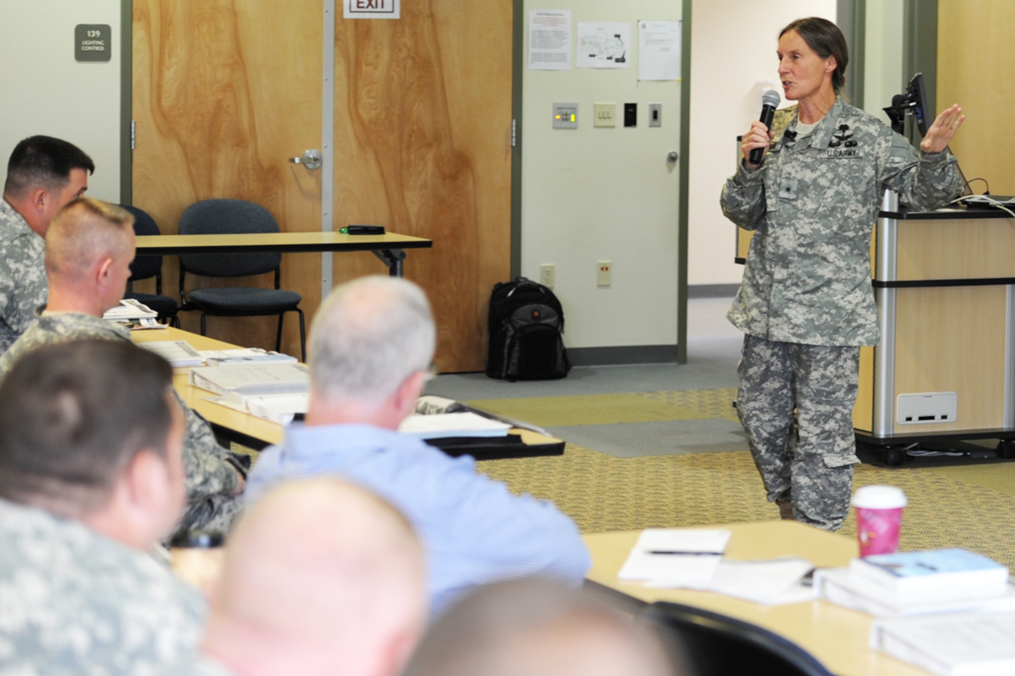 Army Brig. Gen. (Dr.) Rhonda Cornum, Comprehensive Soldier Fitness director, and former prisoner of war gives an introduction to the two-week Master Resilience Trainer program at the Education Center, Monday. Seventy-three Soldiers, Airmen and civilians will spend 80 class hours learning how to teach resilience techniques to their respective units. (U.S. Air Force photo/Luke Waack)