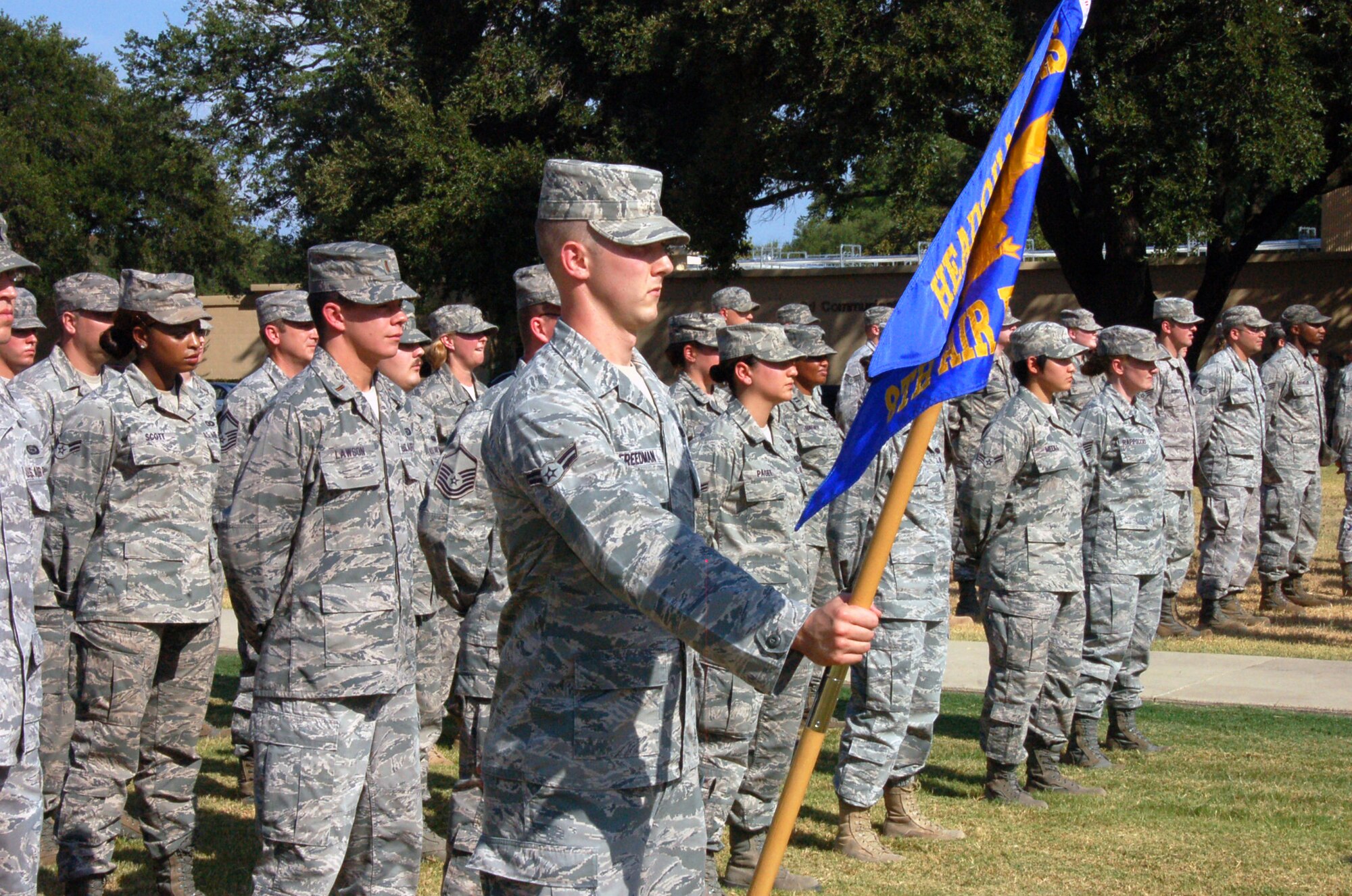 BARKSDALE AIR FORCE BASE, La. - Members of the Eighth Air Force Headquarters participate in a retreat ceremony with the 2nd Medical Group Aug.10, 2011, at Barksdale Air Force Base, La. The retreat ceremony serves a twofold purpose. It signals the end of the official duty day and serves as a ceremony for paying respect to the flag. When persons not assigned to a formation are outdoors and in uniform, on the first note of retreat, they should face the flag (if visible) or music and assume the position of parade rest. (U.S. Air Force photo by Staff Sgt. Brian Stives)