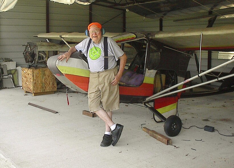James “Tony” Spletstoser poses in front of his ultra-light aircraft. The 84-year-old 402nd Electronics Maintenance Group mechanic has cheated death more than once over the past few years, most recently when he crashed the aircraft shown here. Courtesy photo