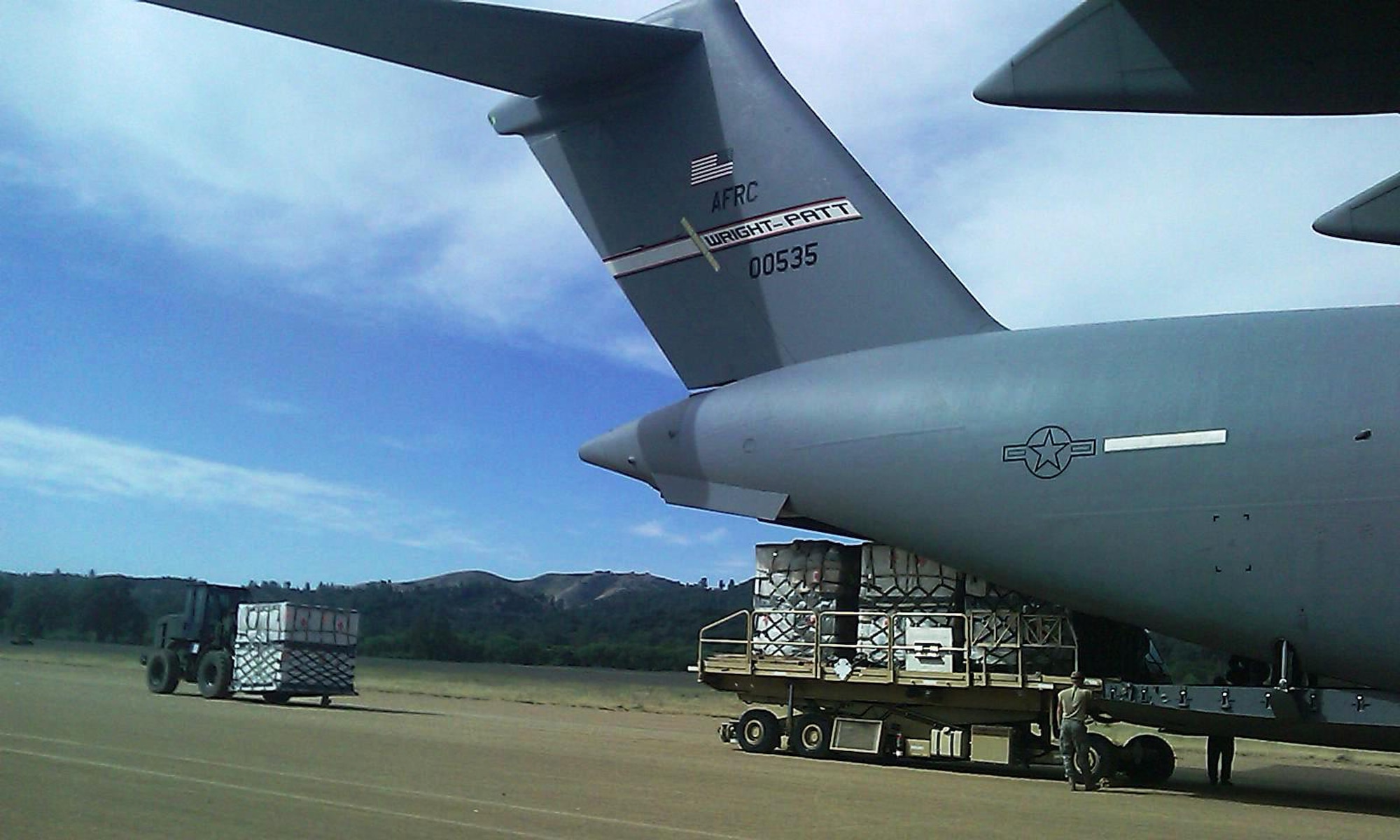 WRIGHT-PATTERSON AIR FORCE BASE, Ohio - A 445th Airlift Wing C-17 Globemaster III has cargo loaded in support of Global Medic 2011 at Schoonover Field, Fort Hunter Liggett, Calif., May 25. (U.S. Air Force photo/Lt. Col. Richard Klarich) 
