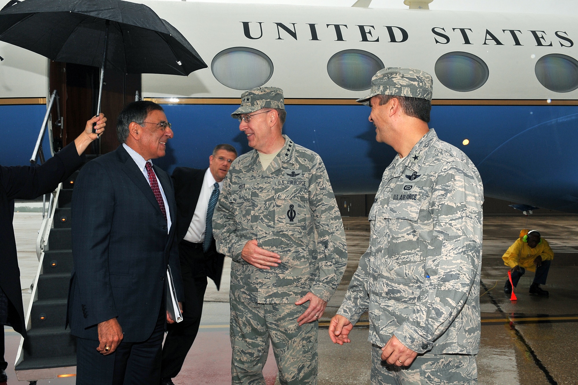 U.S. Air Force Gen. C. Robert Kehler, U.S. Strategic Command commander, greets Secretary of Defense Leon Panetta, and introduces him to Brig. Gen. Donald Bacon, 55th Wing commander, at the Base Operations building on Offutt Air Force Base, Neb., Aug. 5. Panetta came to Offutt to visit U.S. Strategic Command leadership and service members. (U.S. Air Force Photo by Charles Haymond)