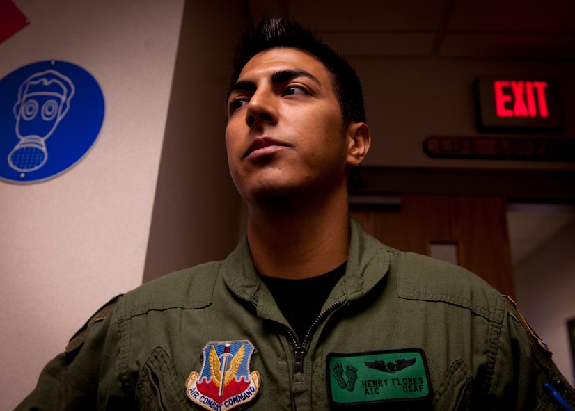U.S. Air Force Airman 1st Class Henry Flores, 41st Rescue Squadron aerial gunner, stands in the squadron’s hallway waiting for his pre-flight brief at Moody Air Force Base, Ga., Aug. 3, 2011. The objective of a pre-flight briefing is to gather meteorological and aeronautical information necessary to conduct a safe and efficient flight to accomplish the mission. (U.S. Air Force photo by Airman 1st Class Joshua Green/Released)
