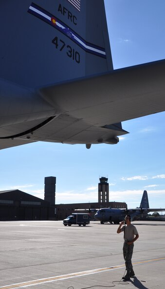 Airman Jesse Pabon inspects the main controls of a C-130H Hercules aircraft assigned to the 302nd Airlift Wing at Peterson Air Force Base, Colo. Pabon, a crew chief assigned to aircraft 94-7310 in the wing's inventory, was one of several Air Force Reserve Airmen who assisted in
achieving the C-130's black letter designation, the second 302nd AW C-130H to receive that recognition in less than two weeks. (U.S. Air Force photo/Tech. Sgt. Daniel Butterfield)