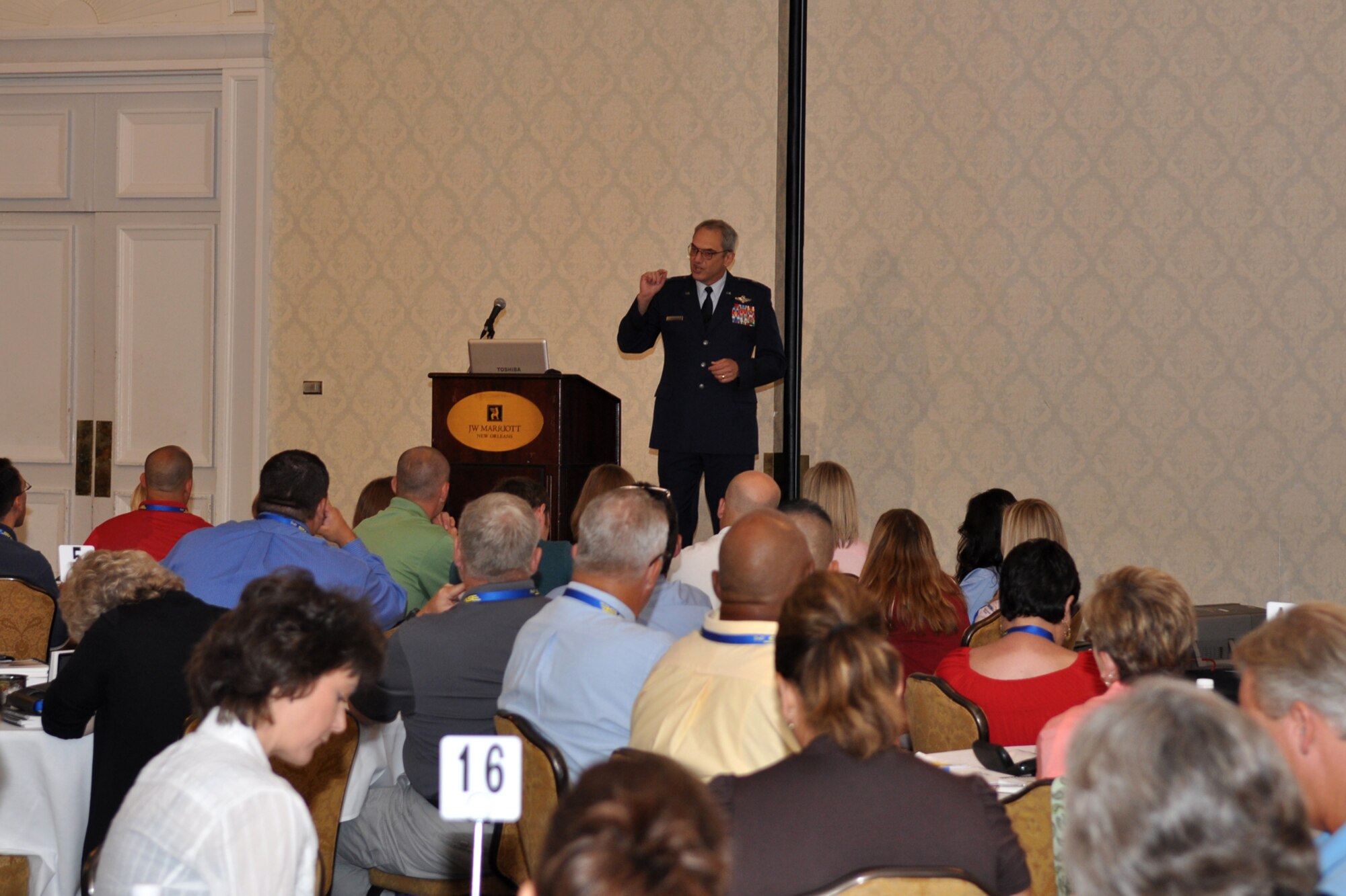 Brig. Gen. John J. Mooney III, the commander of the 307th Bomb Wing at Barksdale Air Force Base, La., challenges the Program Managers, Directors and Instructors during his presentation at the 2011 DoD STARBASE Program Conference at the J.W Marriott Hotel in New Orleans, July 9, 2011. General Mooney was the first guest speaker for the three-day event. The DoD STARBASE program has an annual Director's conference and a bi-annual Instructor's conference. This year, for the first time, the two conferences were held in tandem. (U.S. Air Force photo/Tech. Sgt. Jeff Walston)