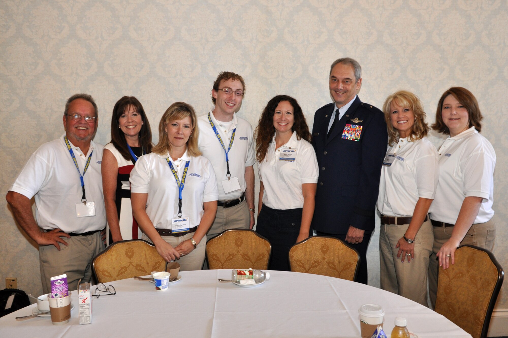 Brig. Gen. John J. Mooney III, the commander of the 307th Bomb Wing from Barksdale Air Force Base, La., poses with a group of educators from STARBASE Louisiana at the 2011 DoD STARBASE Program Conference at the J.W Marriott Hotel in New Orleans, July 9, 2011. General Mooney was the first guest speaker for the three-day event. The DoD STARBASE program has an annual Director's conference and a bi-annual Instructor's conference. This year, for the first time, the two conferences were held in tandem. (U.S. Air Force photo/Tech. Sgt. Jeff Walston)
