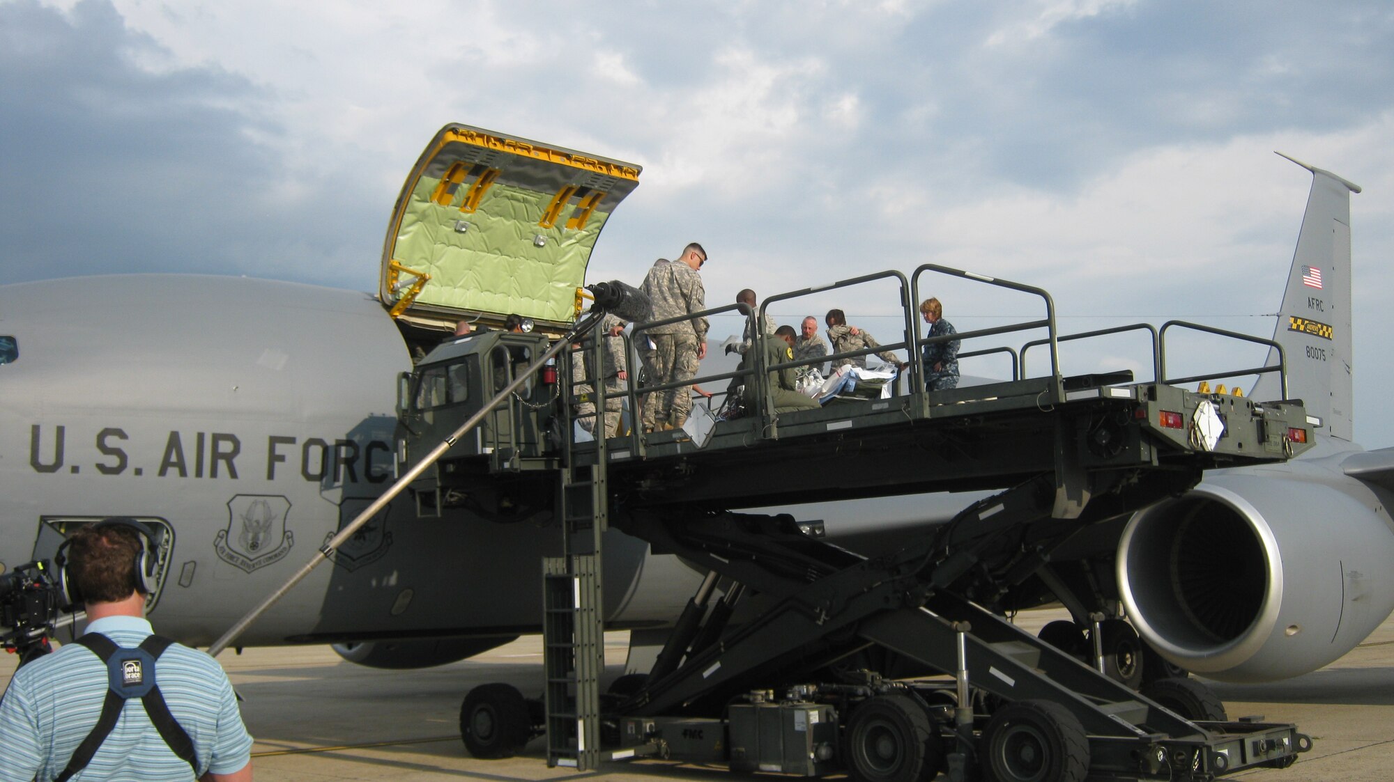A wounded patient is offloaded from a KC-135 on the Joint Base Andrews, Md. flightline. Combat troops typically arrive here within 72 hours of suffering a severe battlefield injury. The aeromedical staging facility at Andrews is the primary East Coast hub for aeromedical evacuation aircraft returning sick or injured patients  from Europe, Africa, and the Middle East to the United State for care. The ASF is the first stop on American soil for Wounded Warriors as they transit from Central Command's theater of operations to their next treatment facility or home in the United States.  (U.S. Air Force photo by Melanie Moore)
