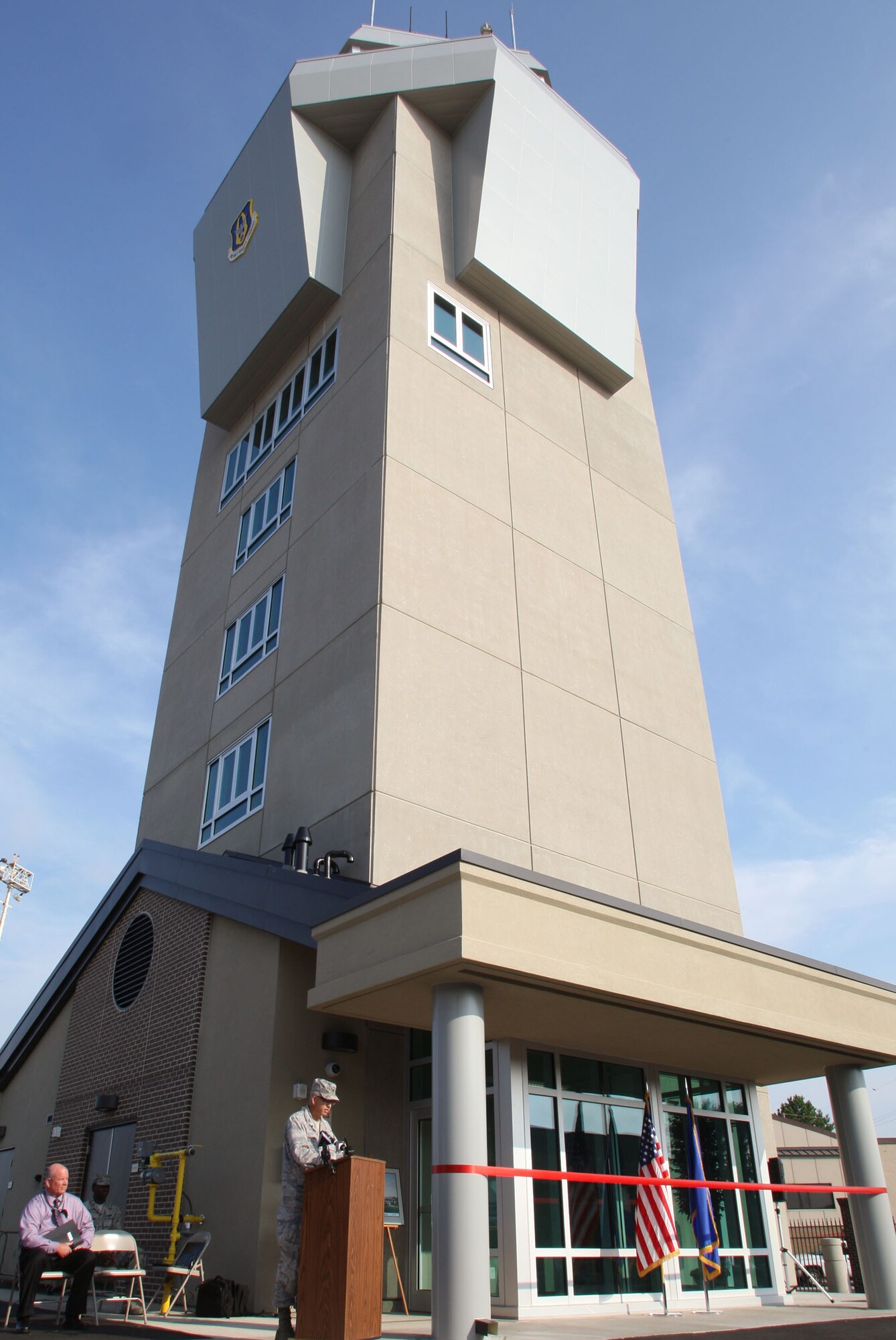 Col. Tim Tarchick addresses distinguished guests, media and service members at the ceremony to commemorate the opening of Dobbins new air traffic control tower Aug. 9. The tower stands 88-feet tall providing greater visibility for airfield operations. (U.S. Air Force photo/Don Peek) 